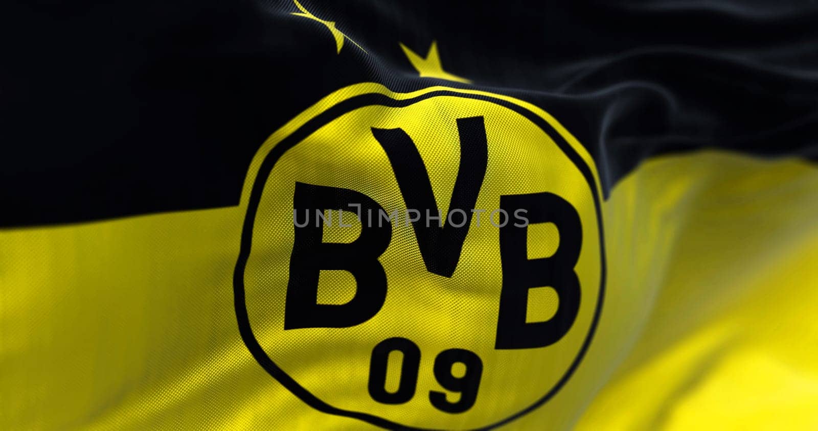 Dortmund, GER, September 2022: The flag of Borussia Dortmund waving in the wind. Borussia Dortmund is a German professional sports club based in Dortmund. 3d illustration