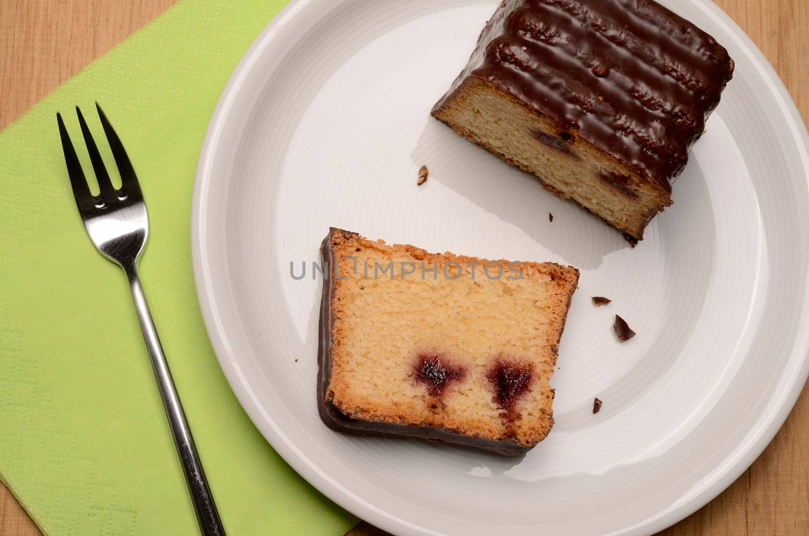 Sweet cherry cake on a white plate