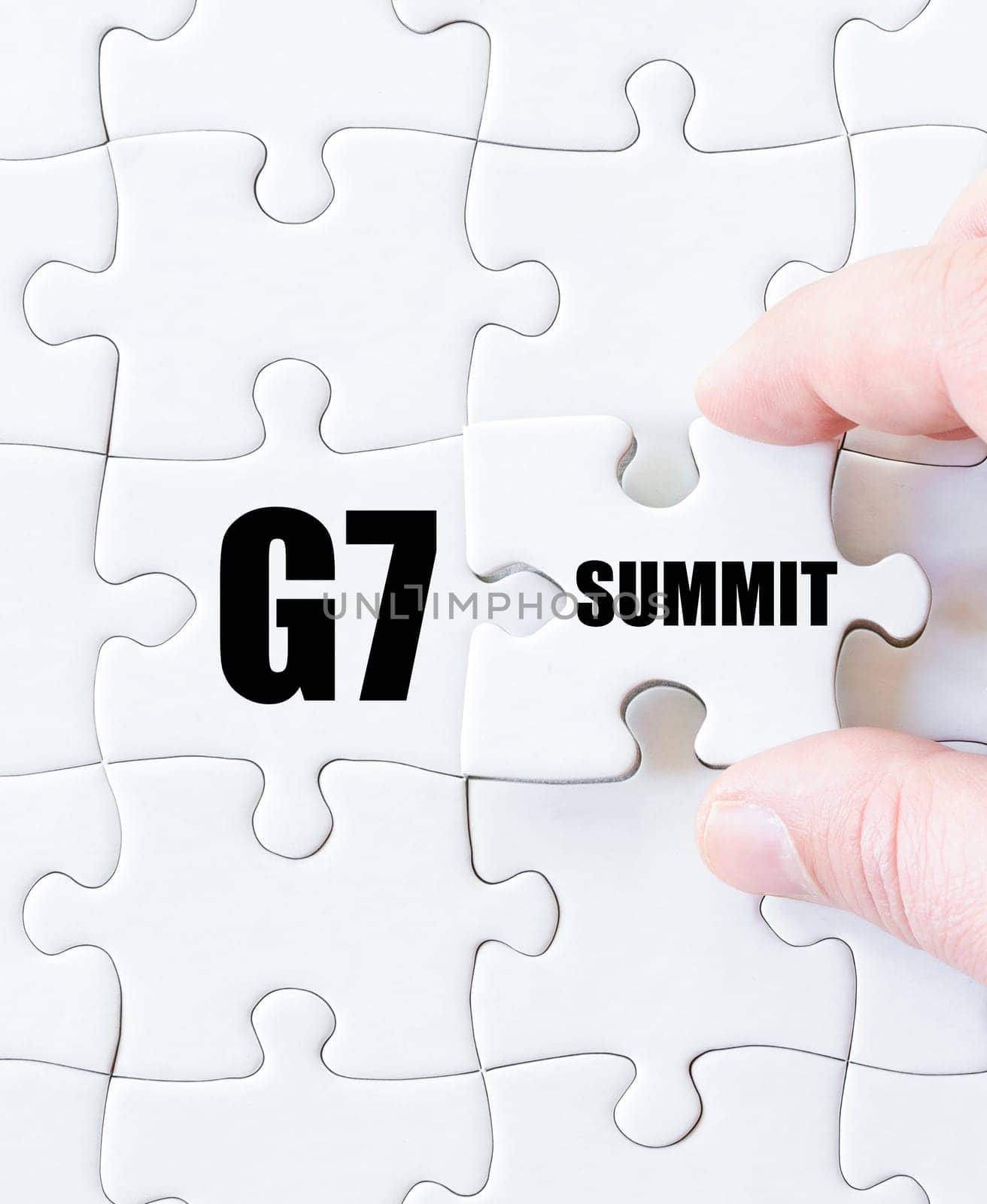 Last puzzle piece with word G7 SUMMIT. Concept image