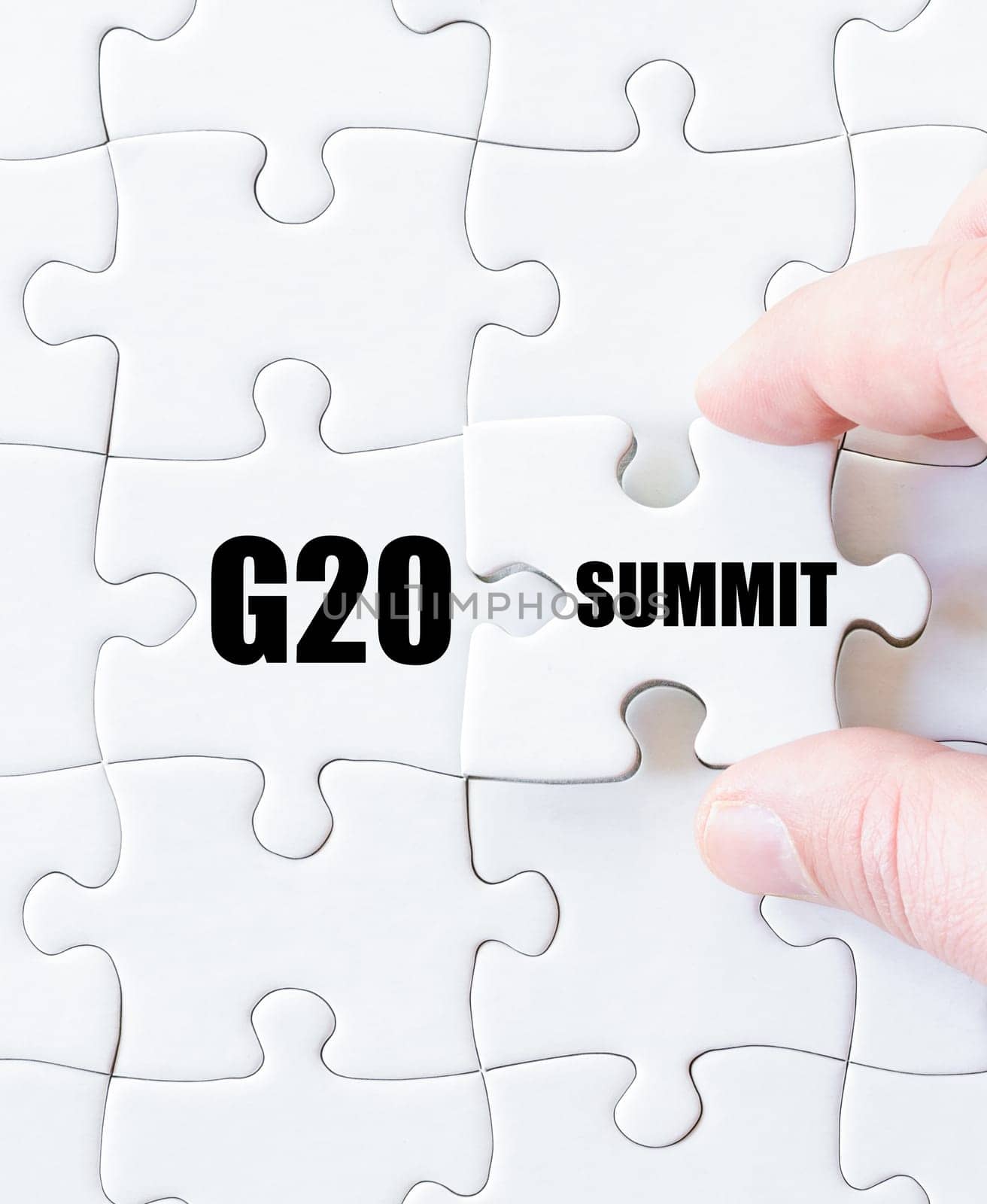 Last puzzle piece with word G20 SUMMIT. Concept image