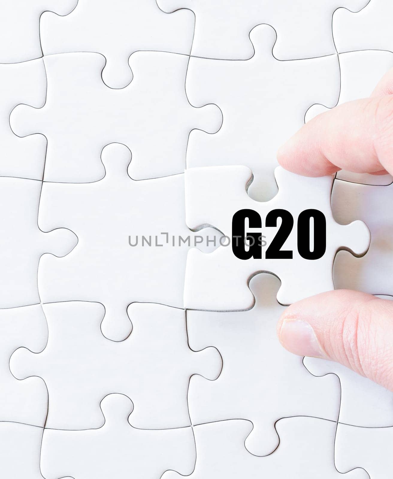 Last puzzle piece with word G20 SUMMIT. Concept image