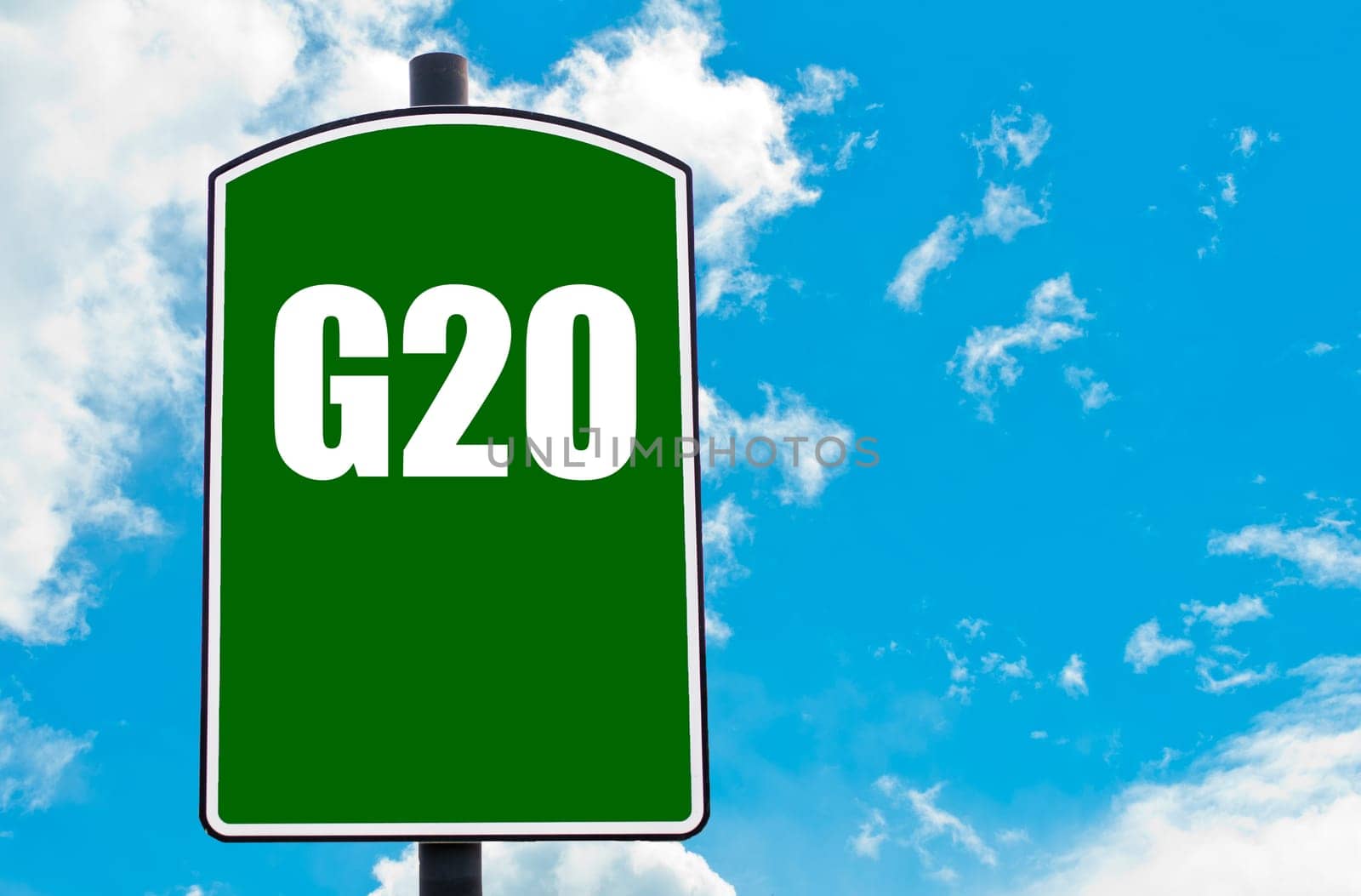 G20 SUMMIT written on green road sign  against clear blue sky background. Concept image with available copy space
