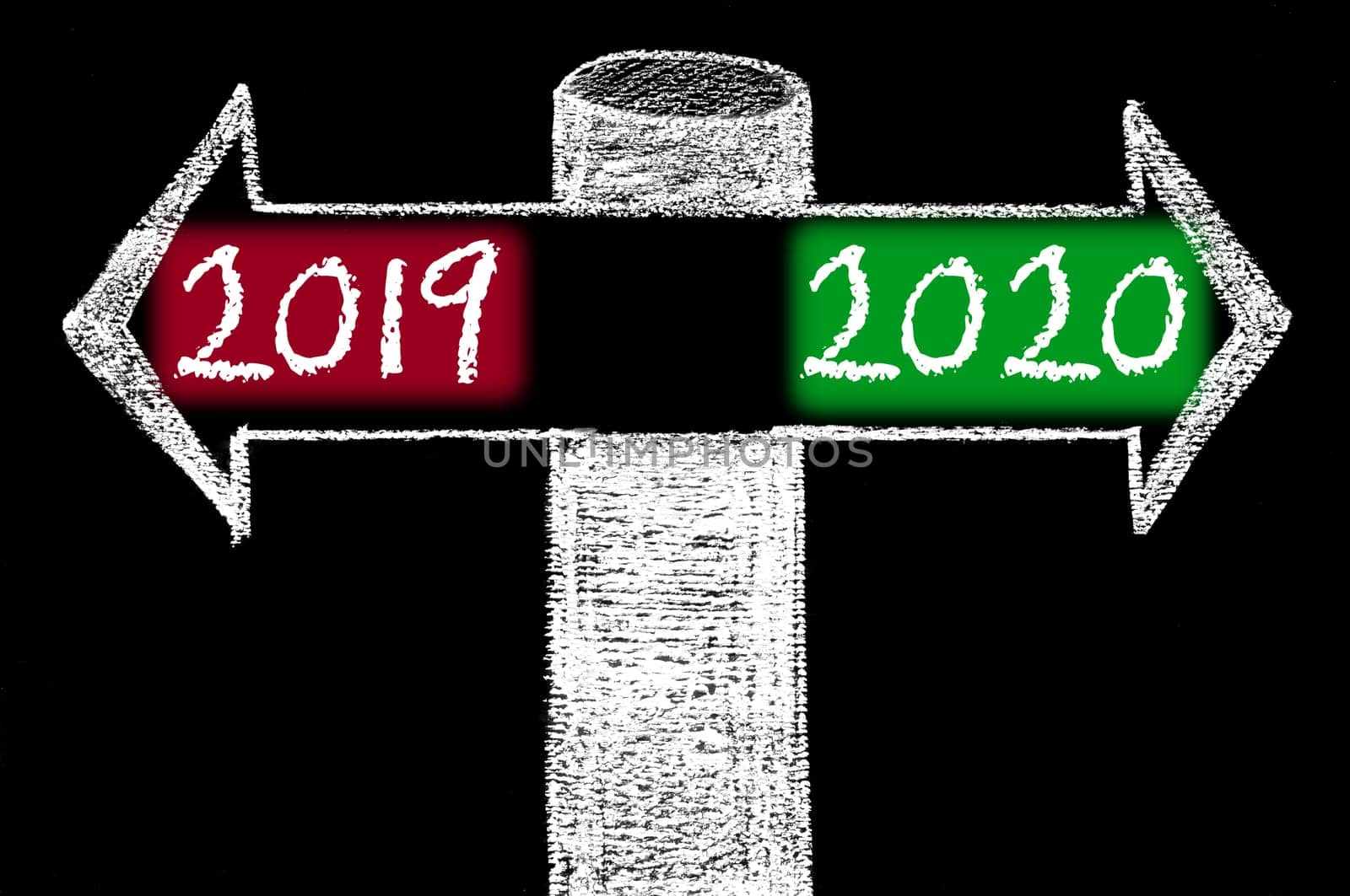 Opposite arrows with Year 2019 versus Year 2020. Hand drawing with chalk on blackboard. Choice conceptual image