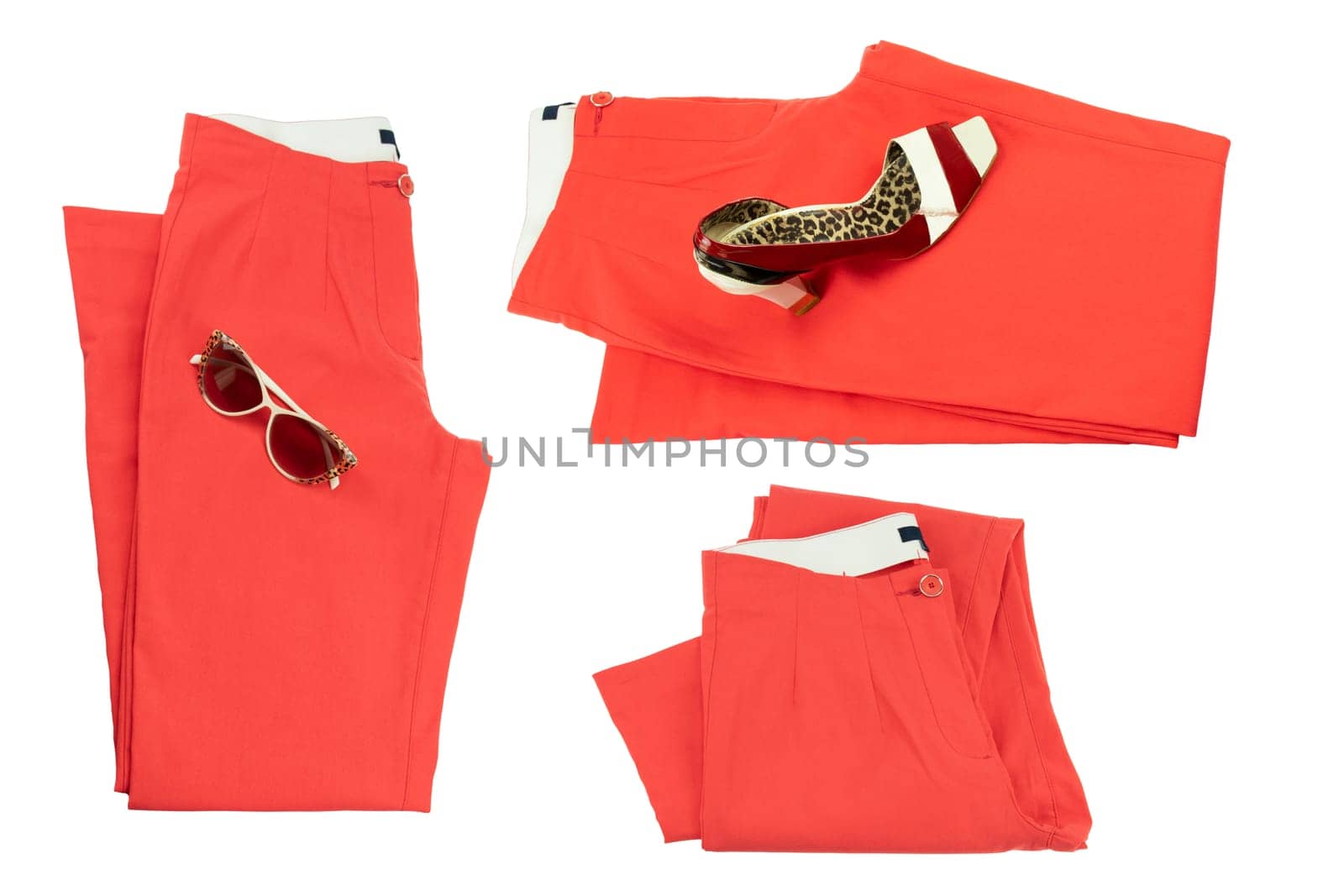 Collage woman clothes. Set of folded red elegant women trousers or denim pants with a matching of elegant single female high heeled shoe and sunglasses. Red fashion concept isolated.
