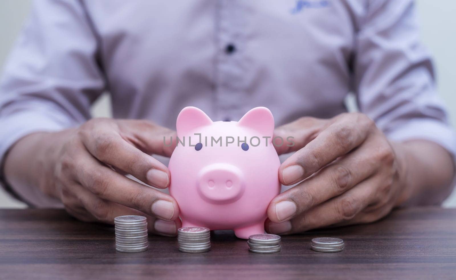 Money and financial concept, Save money and account banking for finance concept, Piggy bank with coin on blurred background