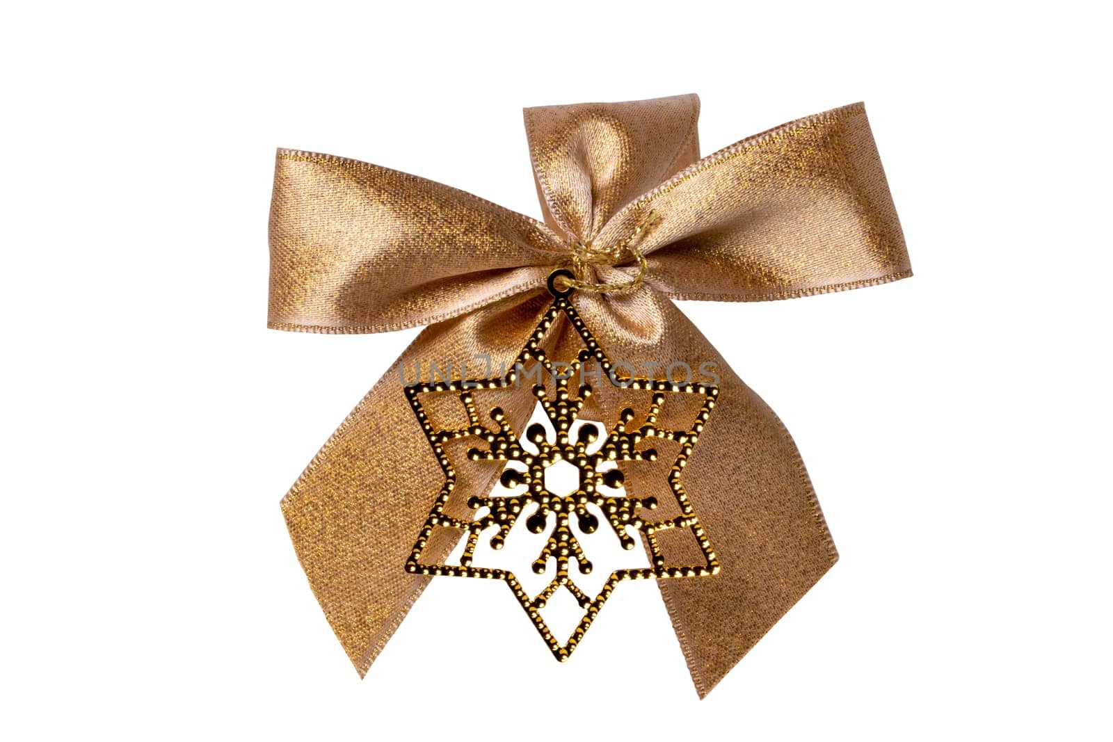 Gift bows. Closeup of a decorative golden ribbon bow made of silk for gift box isolated on a white background. Decorations background with star. Clipping path. Macro photograph.