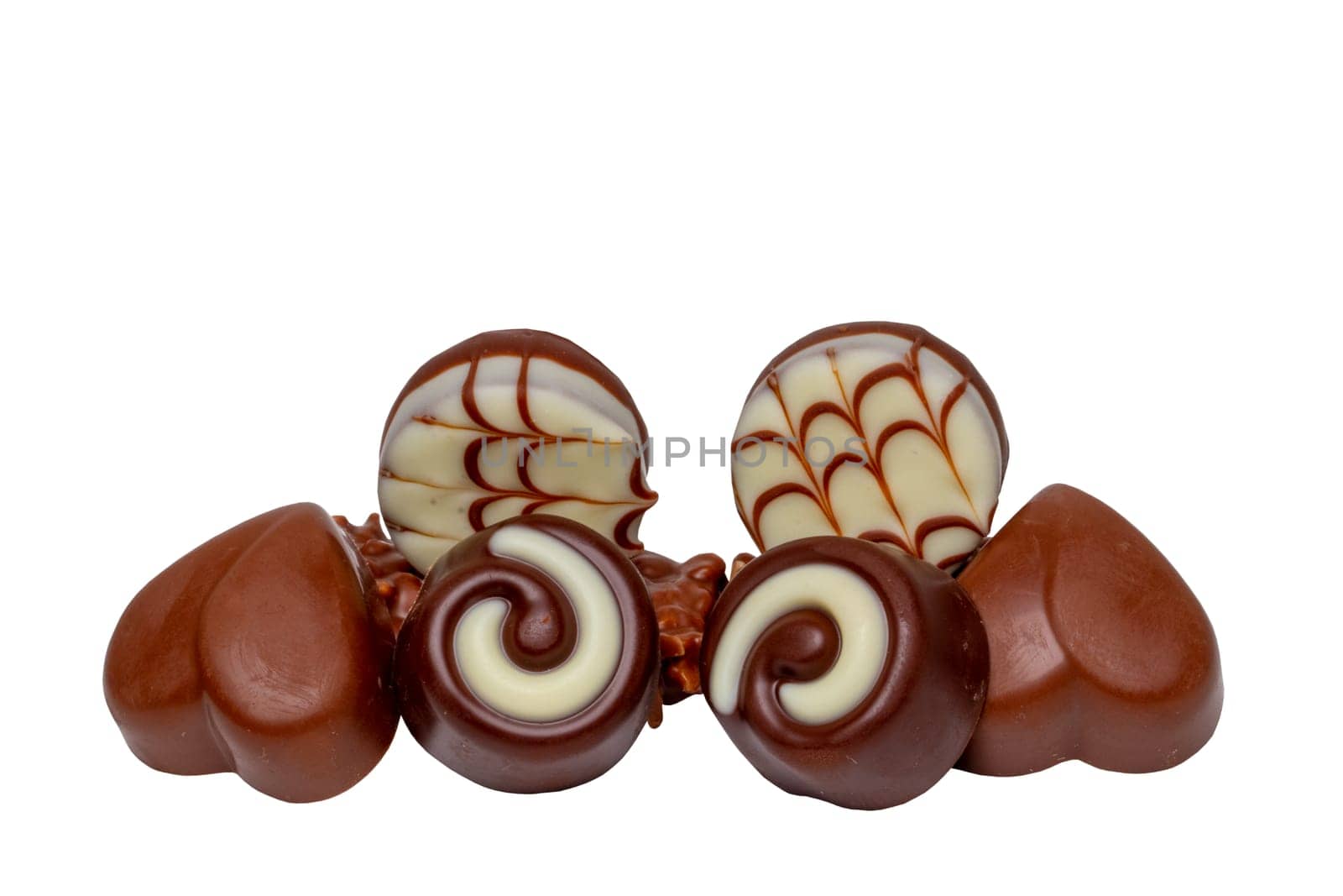 Chocolate candies collection. Beautifully assortment of various chocolate candies sweets isolated of a white background. Clipping path. Macro.