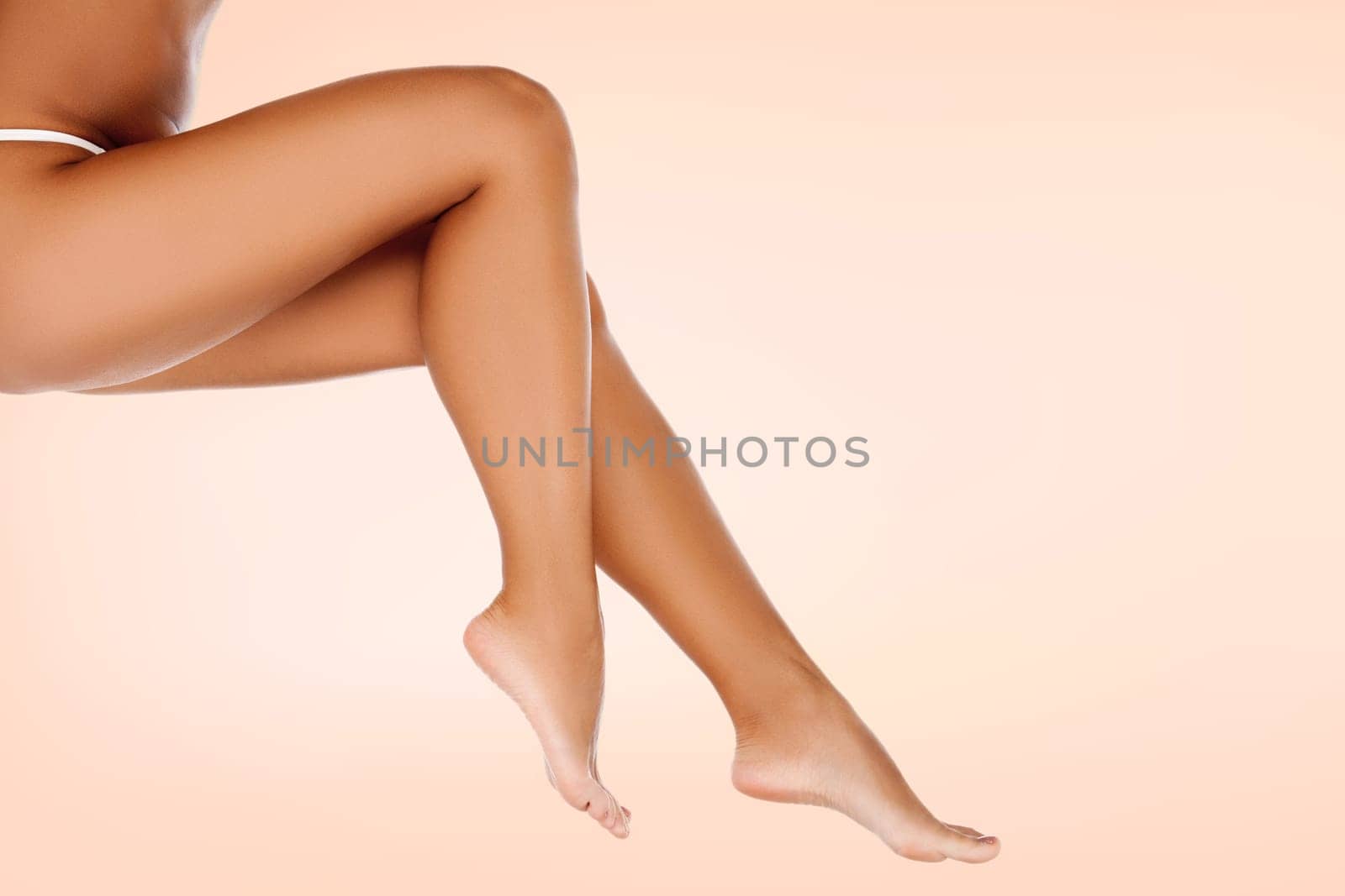 Long smooth female legs, skin care concept