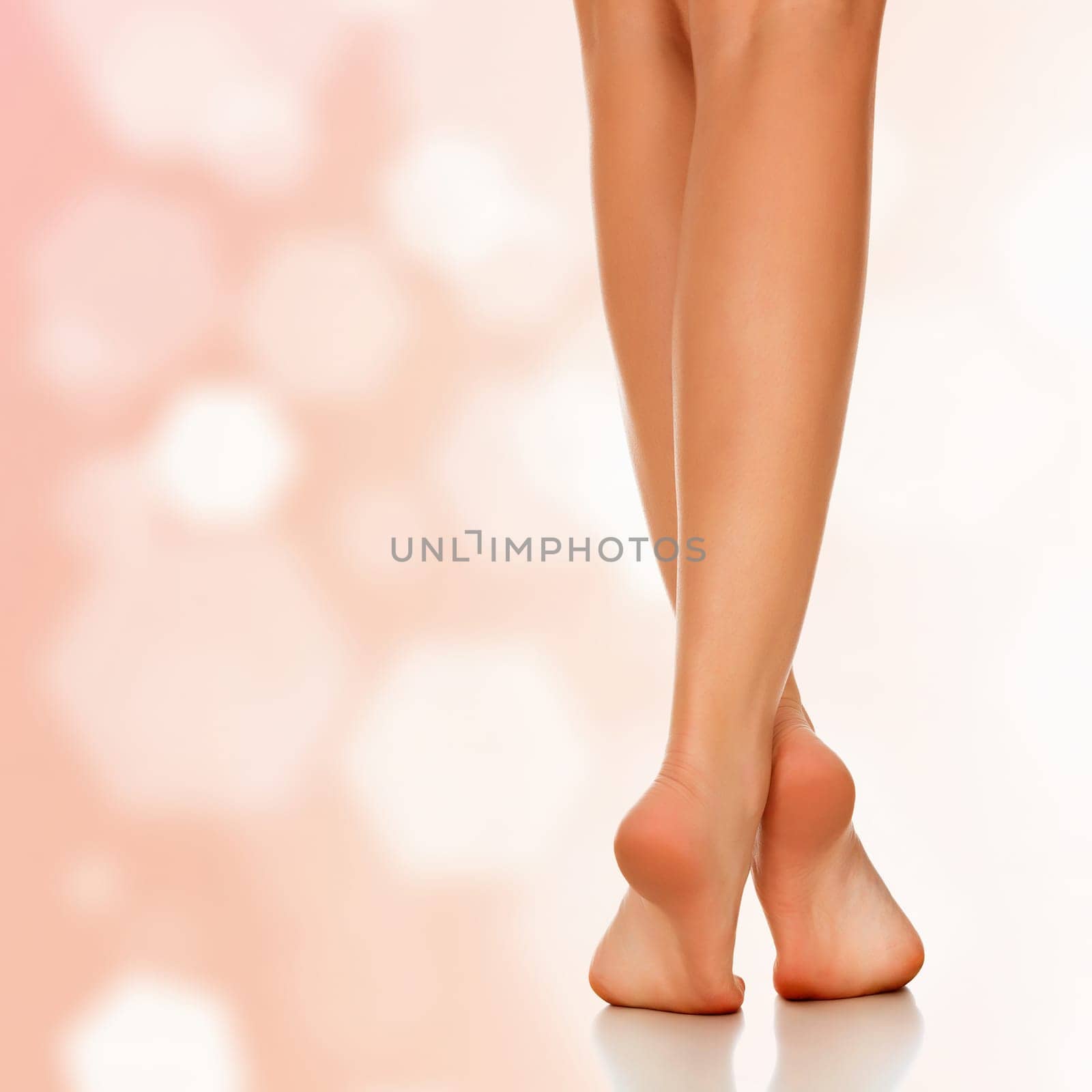 Pretty woman against an abstract background with circles and copyspace.