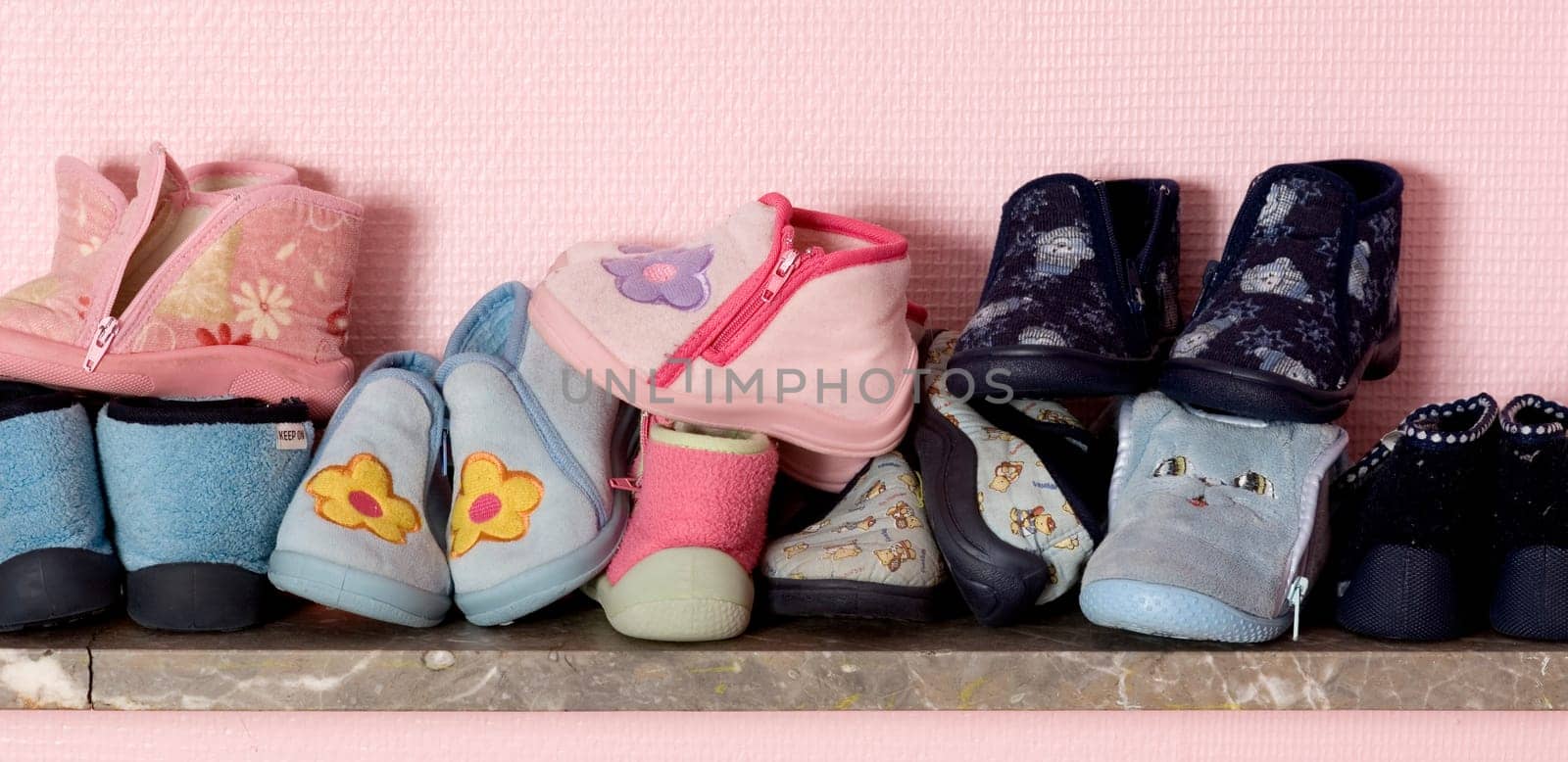 Baby's shoes on a shelve at the nursery