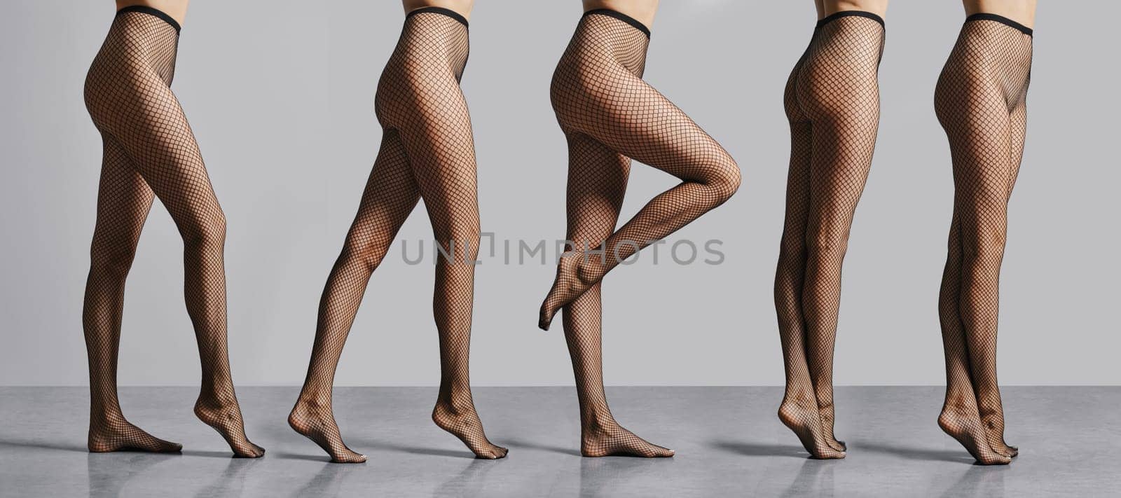 Composition with female legs in fishnet tights standing in profile
