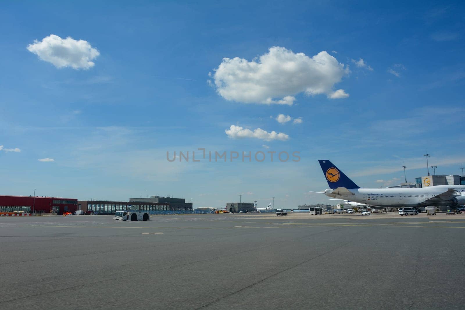 Frankfurt Airport Germany August 02, 2022 - Lufthansa machines at the terminal and on the runway