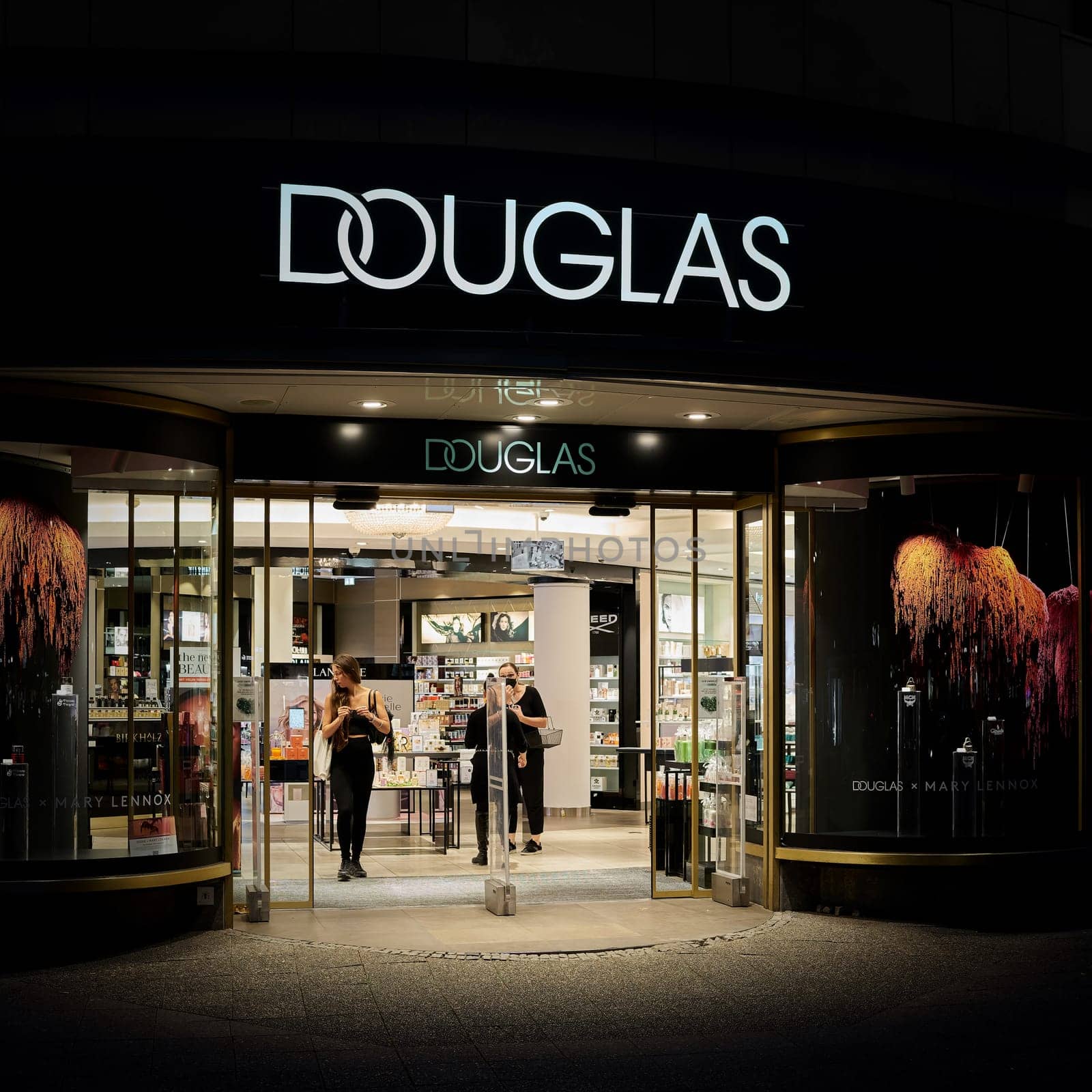 Douglas perfumery store in the popular shopping street Kurfuerstendamm in Berlin in the evening