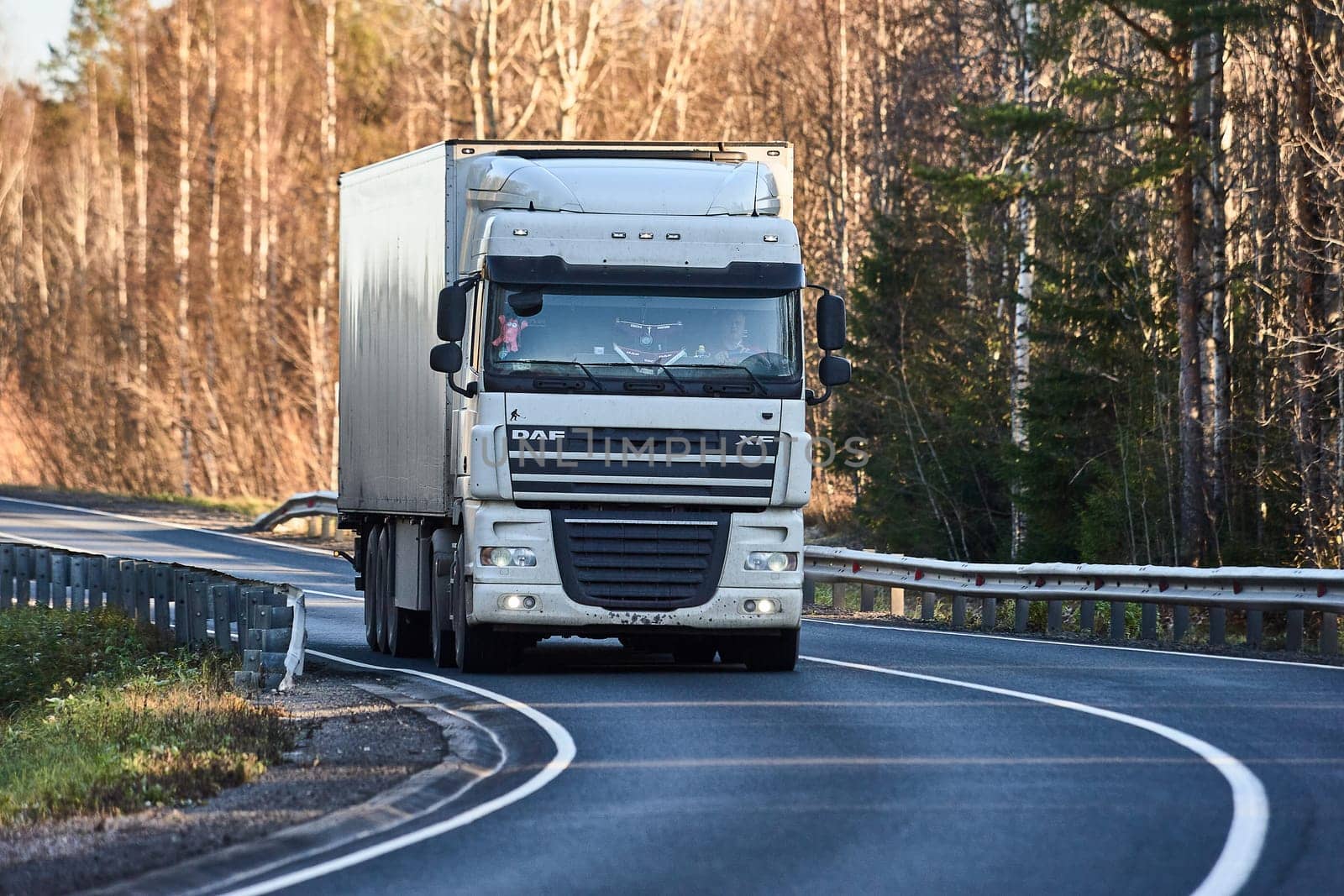 truckers driving on the highway, Russia, Arkhangelsk region, highway M-8 kholmogory 22,10,2022. High quality photo