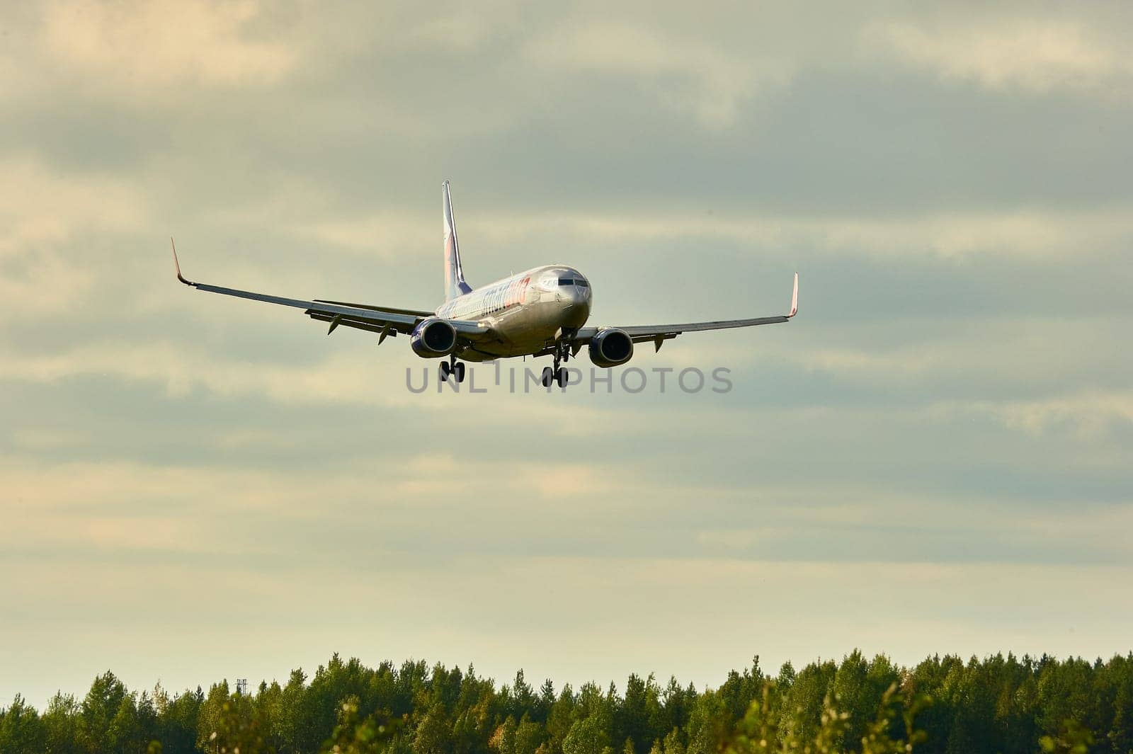 The Boeing plane is landing. Talagi Airport, Arkhangelsk, Russia, 27,08,2022. High quality photo