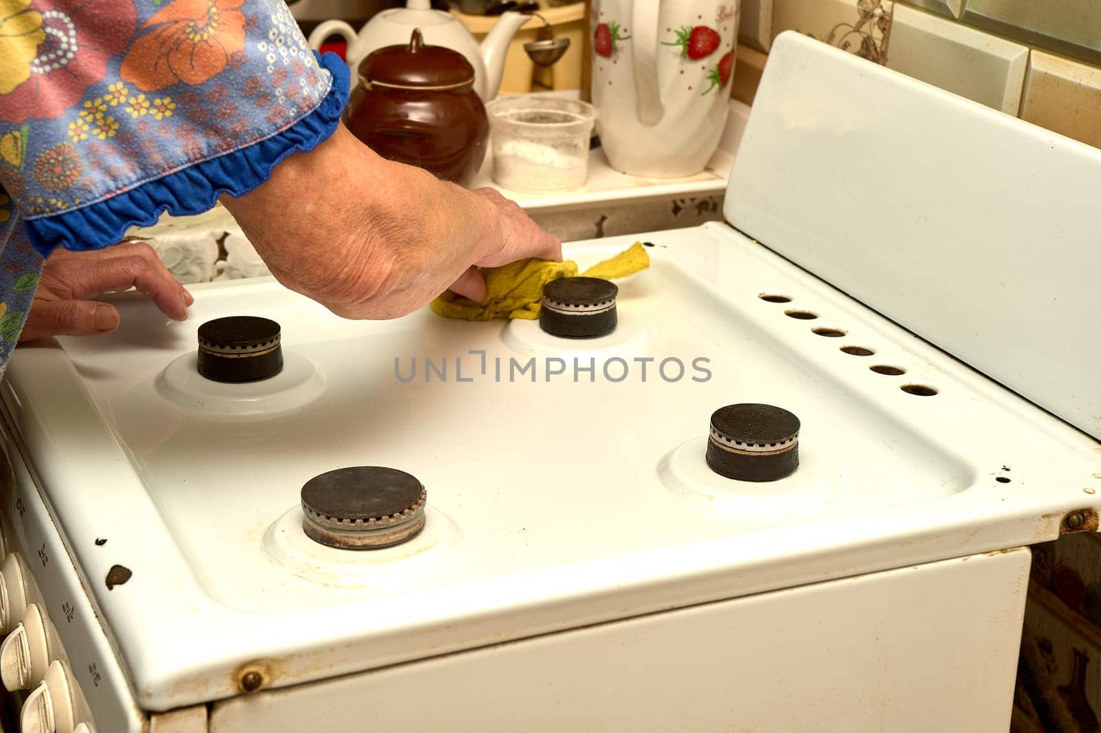 wet cleaning of the gas stove. High quality photo