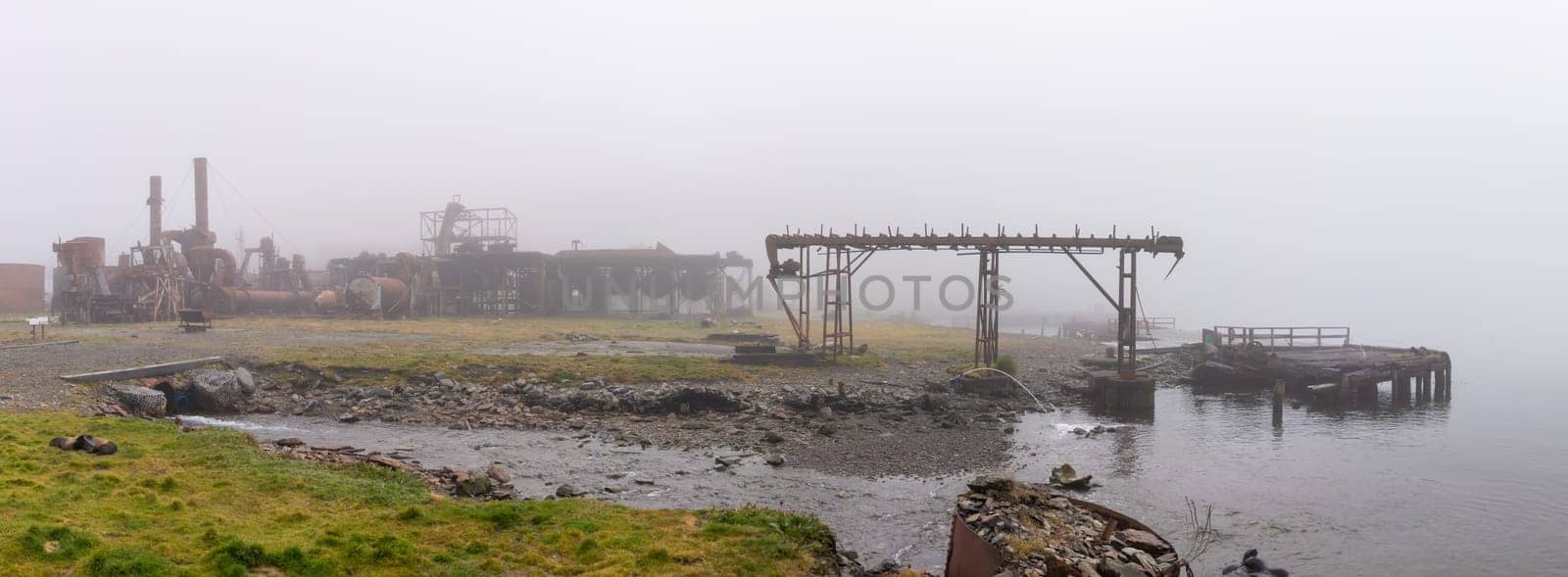 Old, rusty whale oil tanks and processing facilities at a now abandoned whaling station in Grytviken -on the island of South Georgia.