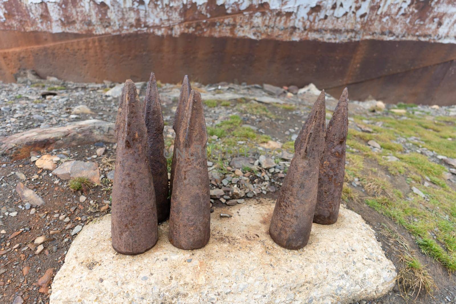 Old, rusty whale oil tanks and processing facilities at a now abandoned whaling station in Grytviken -on the island of South Georgia.