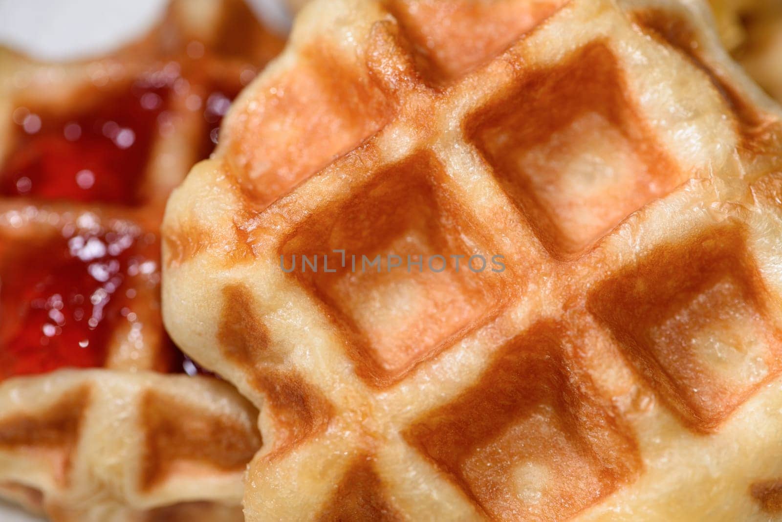 Top view close up of fresh waffles delicious sweet. Making homemade food or dessert at home