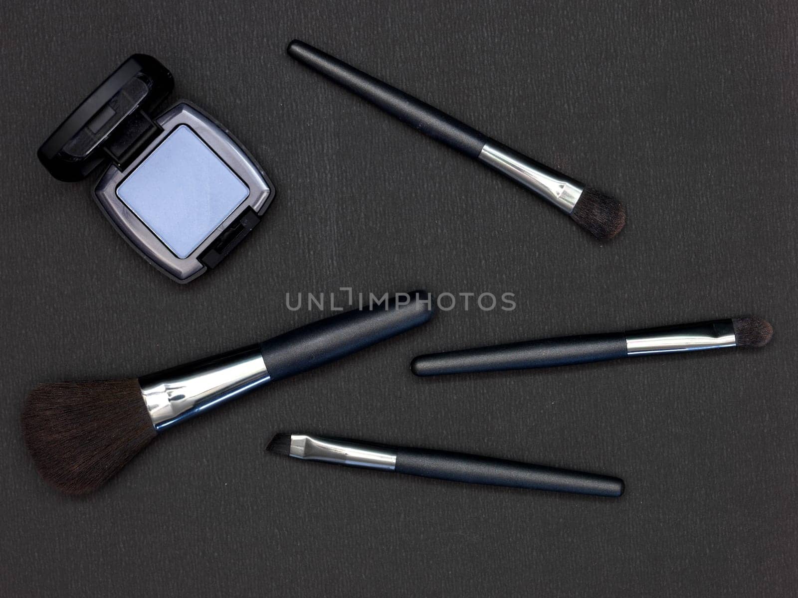 A close up shot of makeup and cosmetics