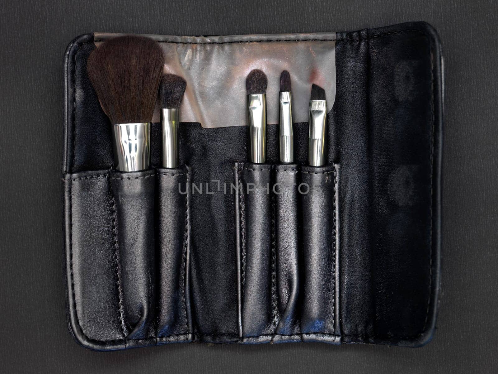 A close up shot of makeup and cosmetics