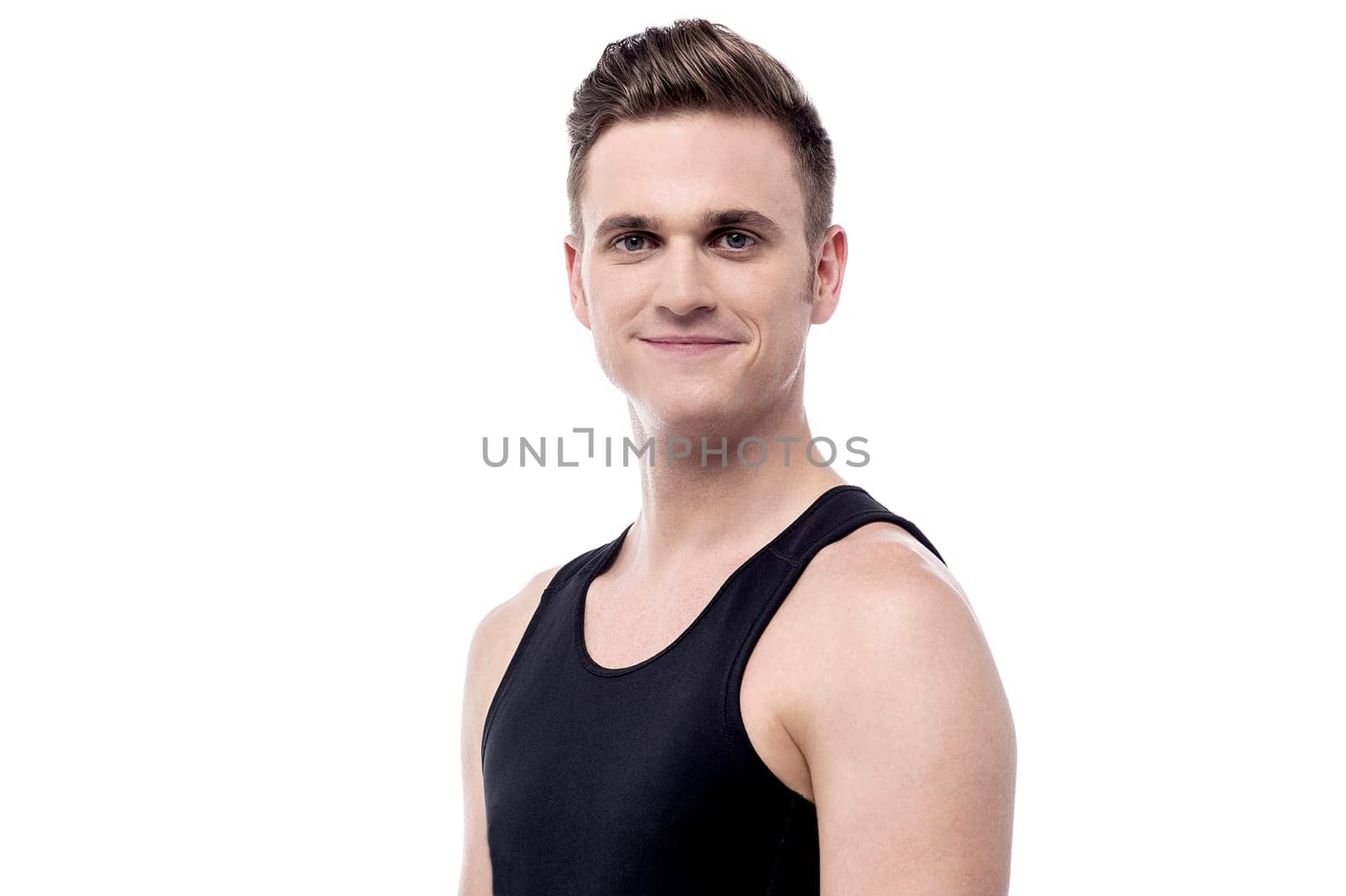 Confident personal trainer posing to camera