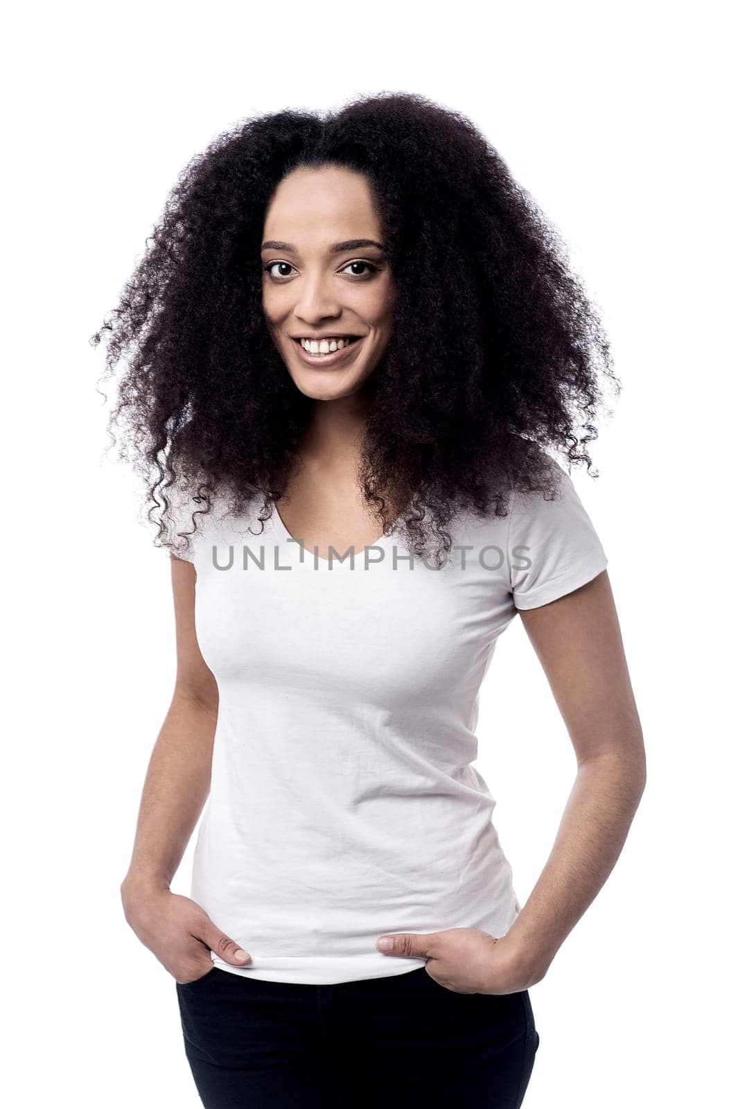 Pretty woman with hands in pockets