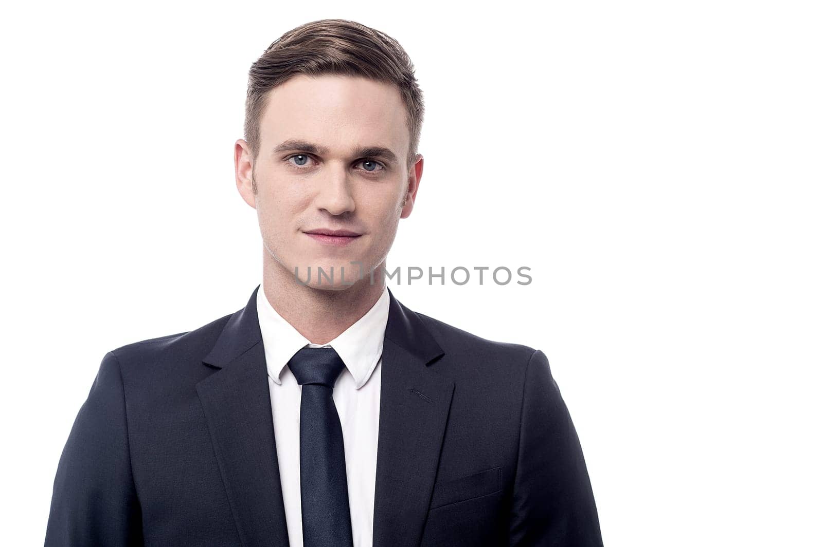 Handsome businessman posing over white
