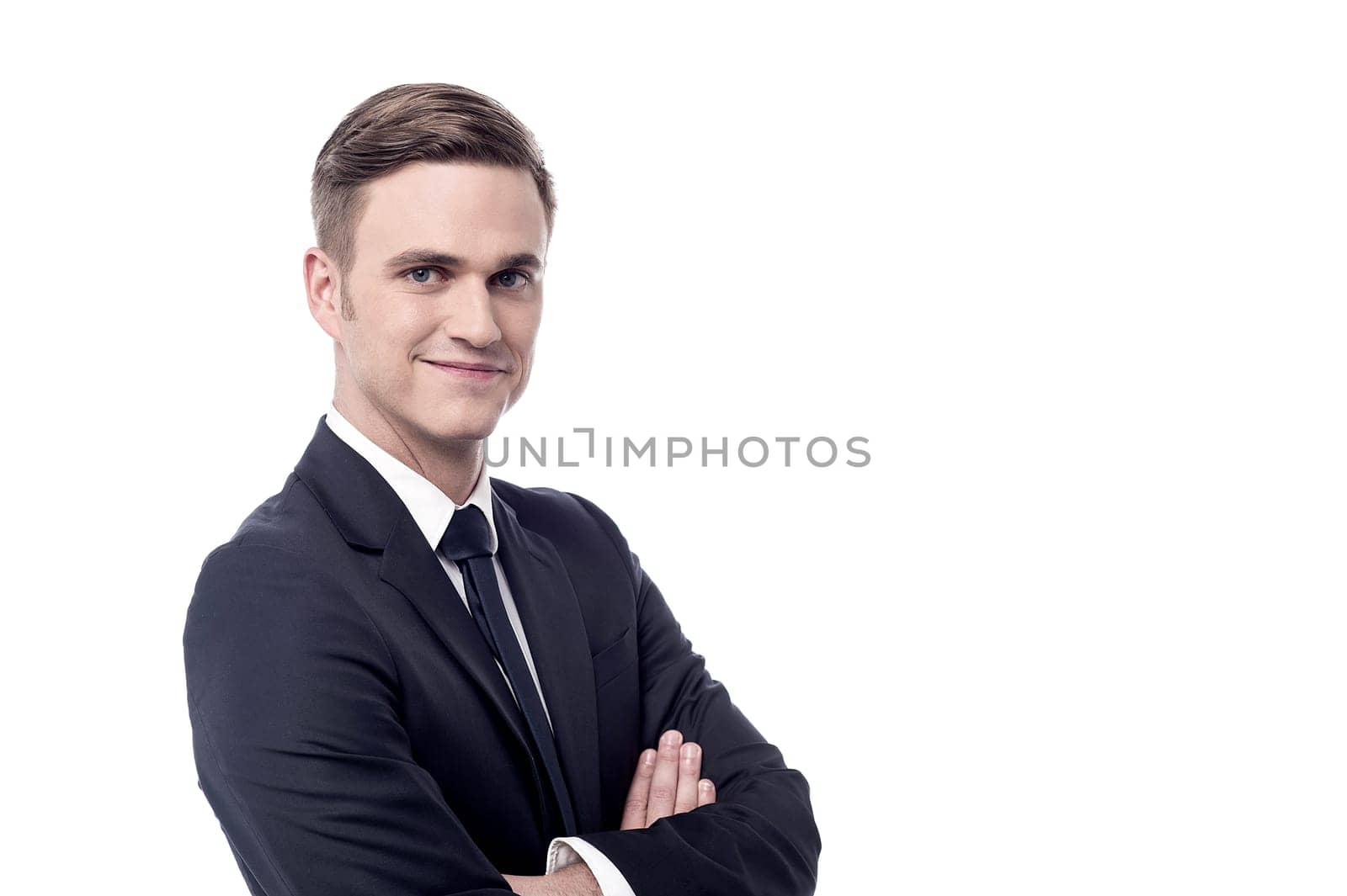Successful businessman with folded arms