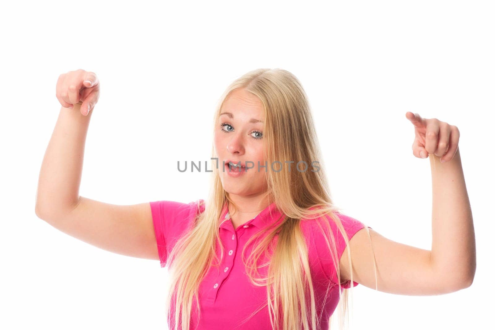 Young blonde woman conducts with her fingers