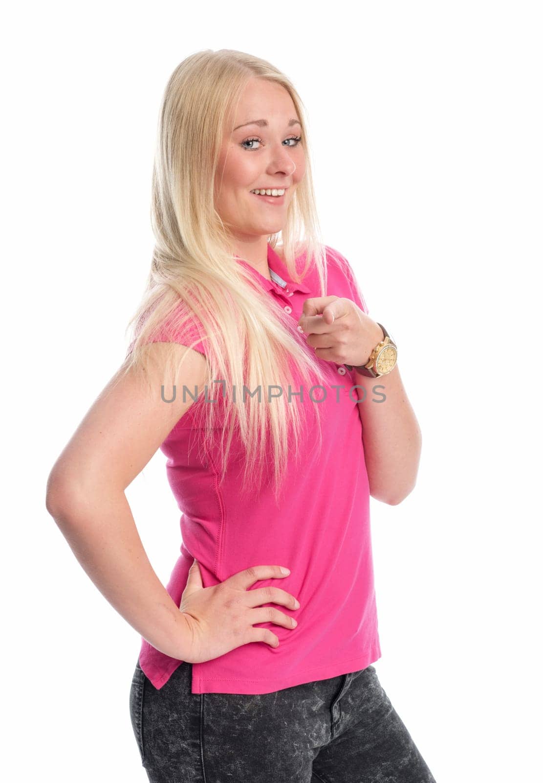 Young blonde woman points to something and is hurtful