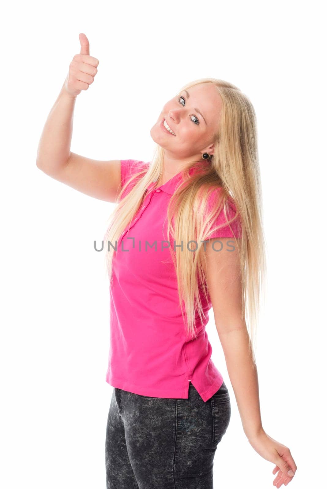 Young blonde woman shows thumbs up