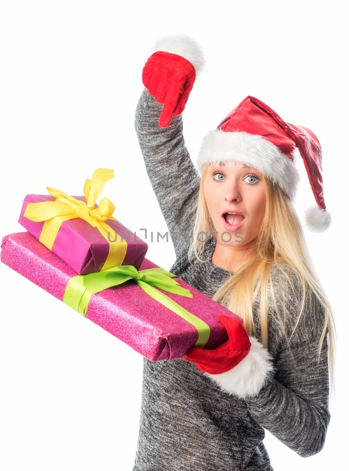 Christmas woman points to gifts