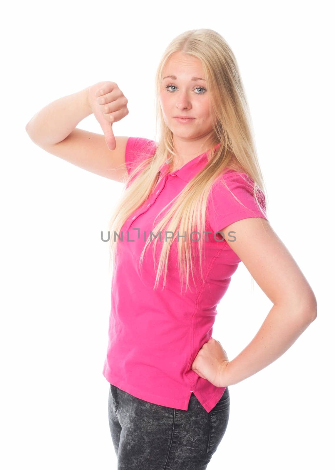 Blonde young girl shows thumbs down