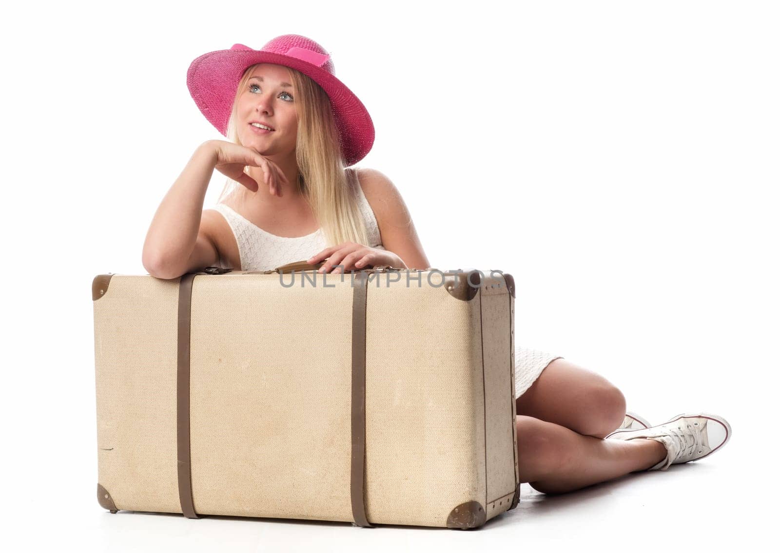 Girl with suitcase looks happy up