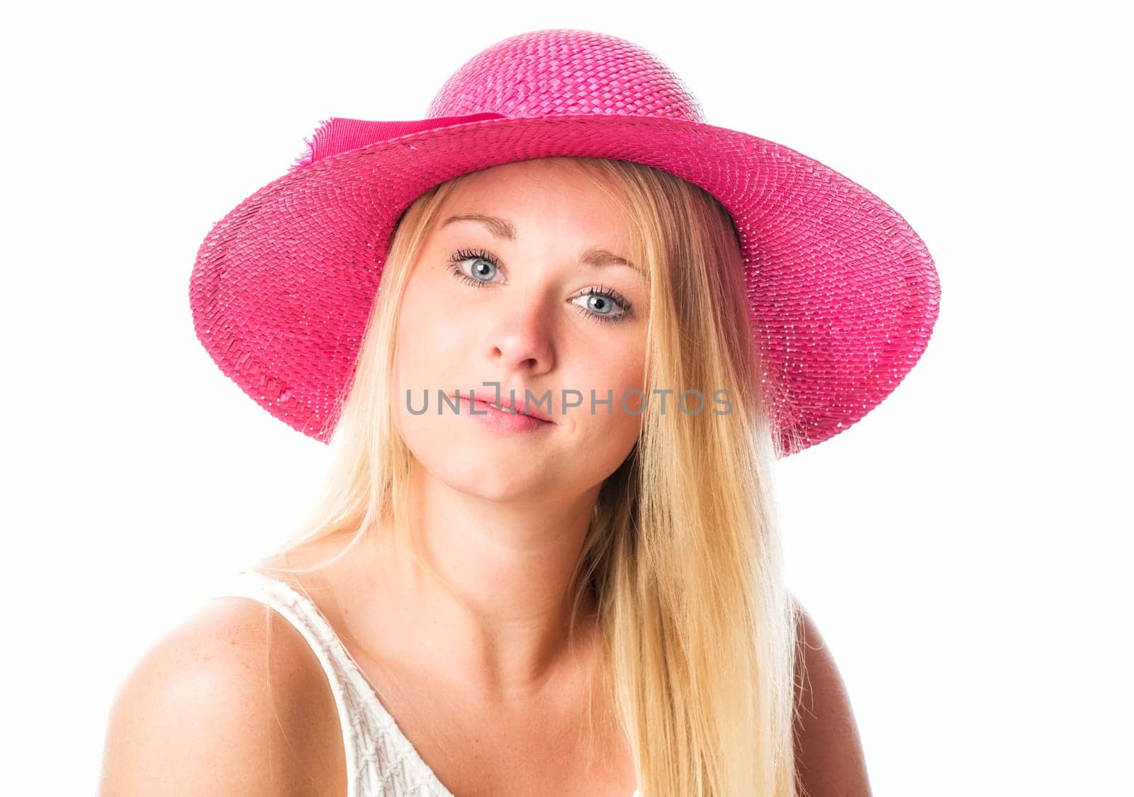 Blonde girl with straw hat in portrait