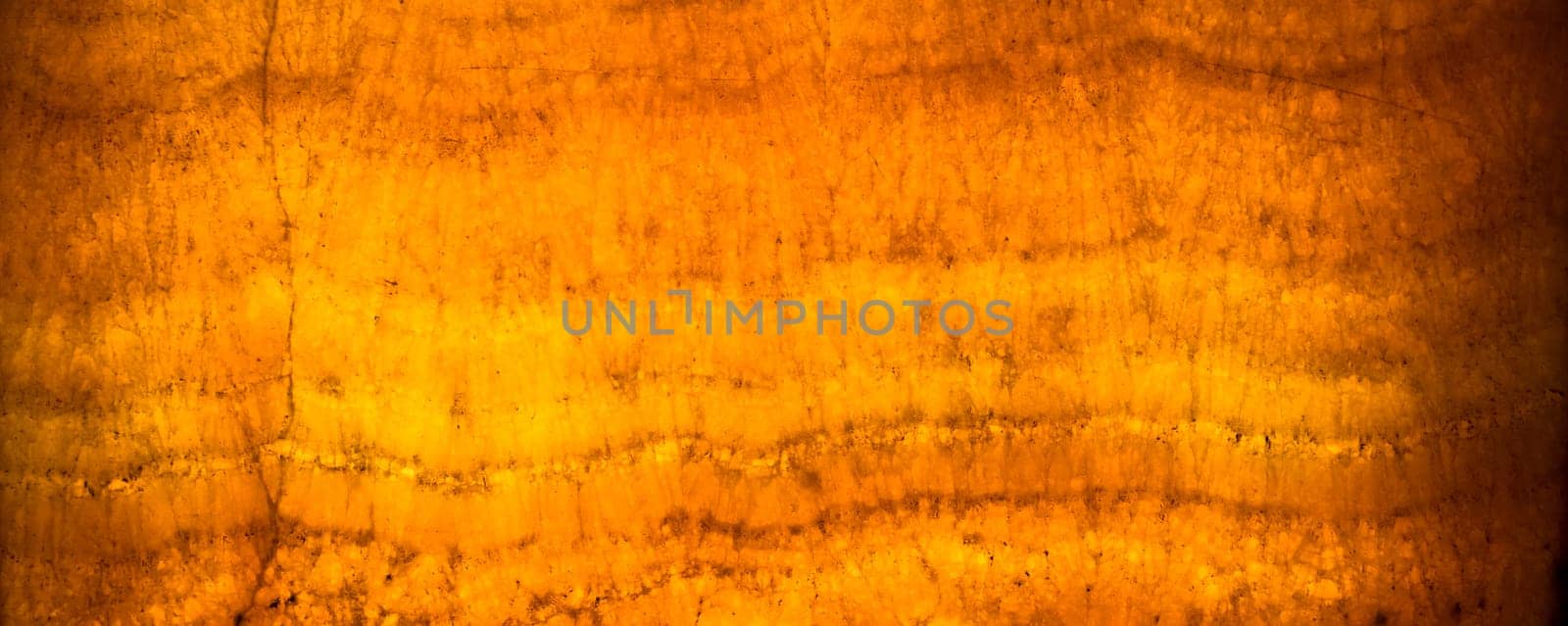 Architectural detail of an antique alabaster stone sheet. Alabaster is translucent enough to be used for small windows. It was used for this purpose in Byzantine churches. Image useful for an elegant background.