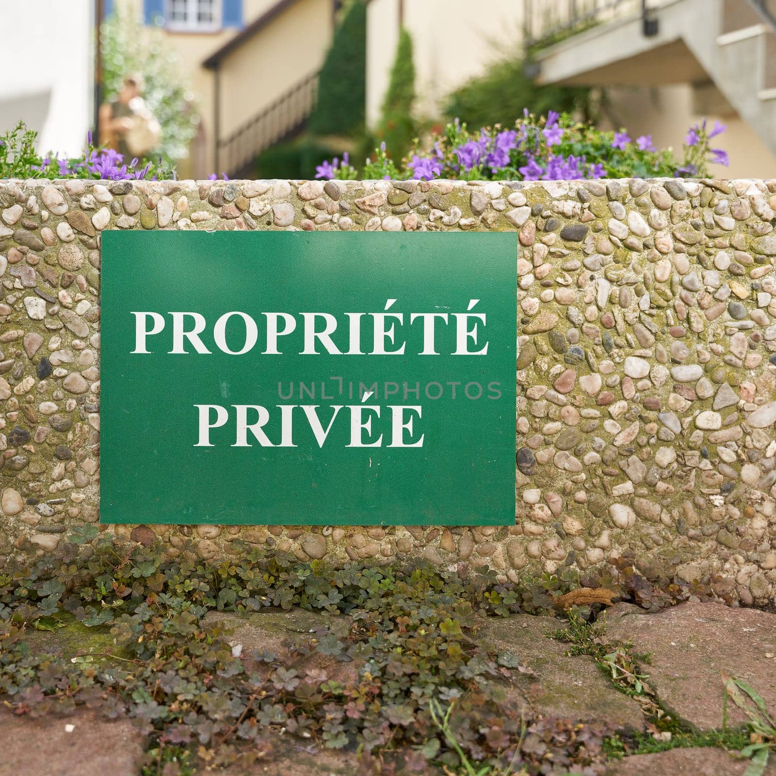 Sign at a parking lot in France with the French inscription propriete privee. Translation: private property