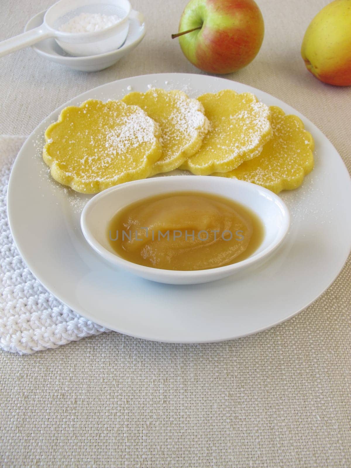 Oven-baked gluten-free corn cake with apple sauce