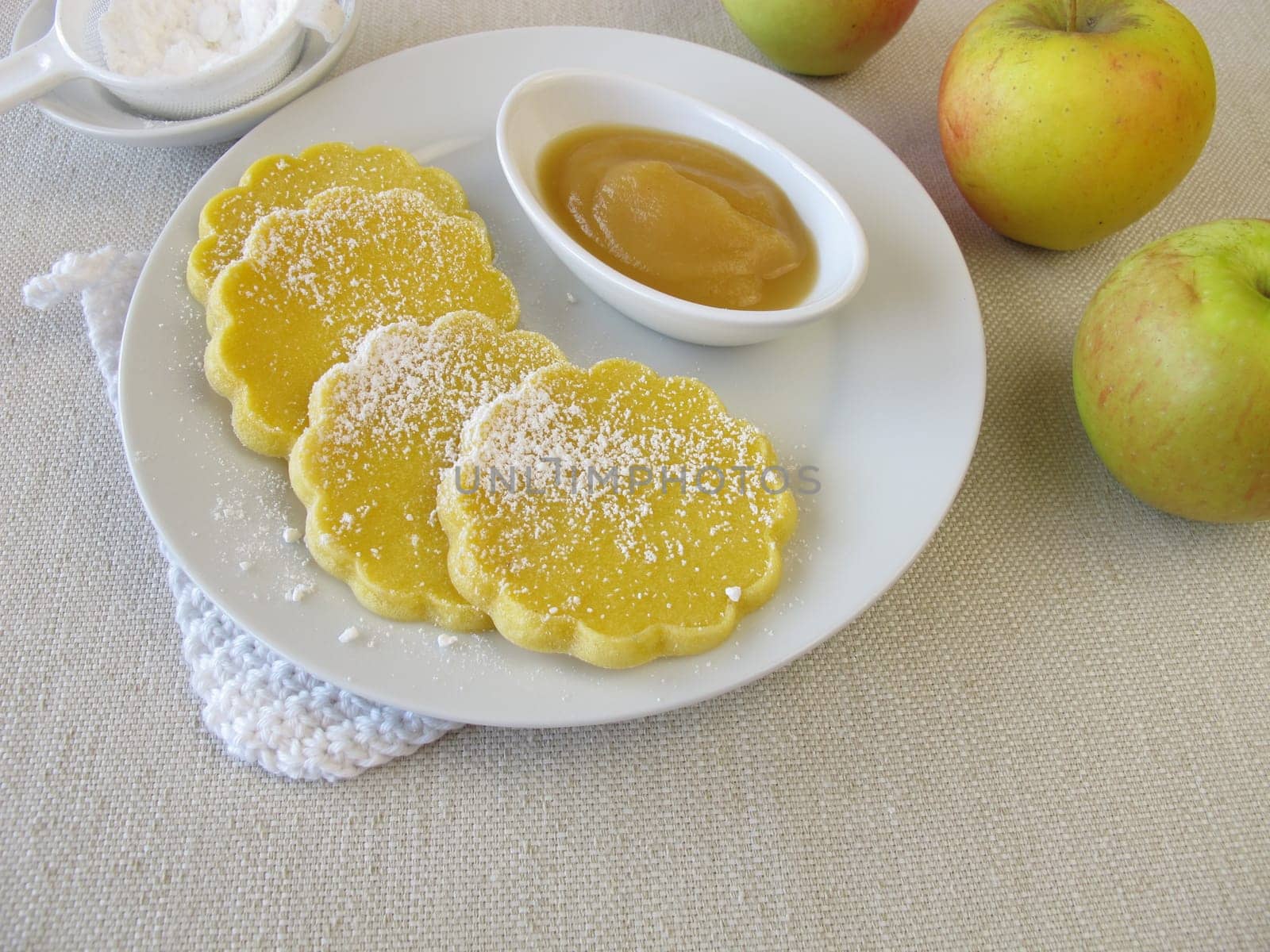 Oven-baked gluten-free corn cake with apple sauce