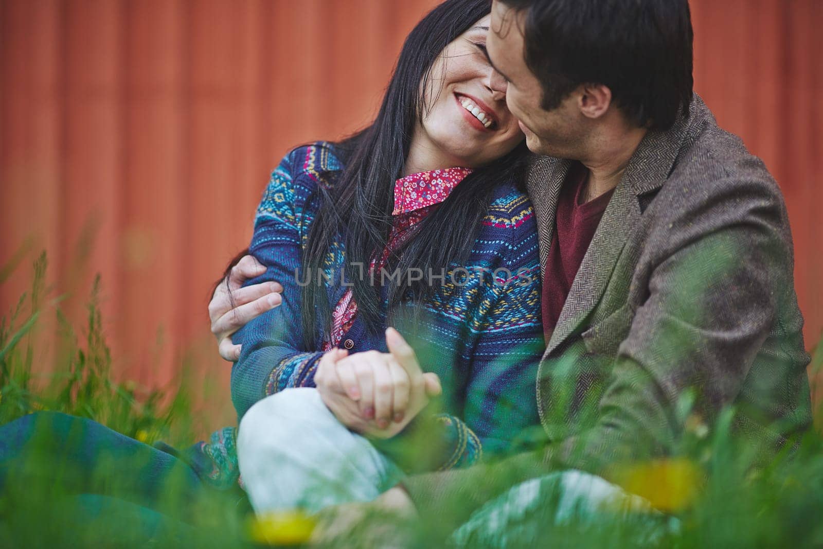 Young man embracing his girlfriend