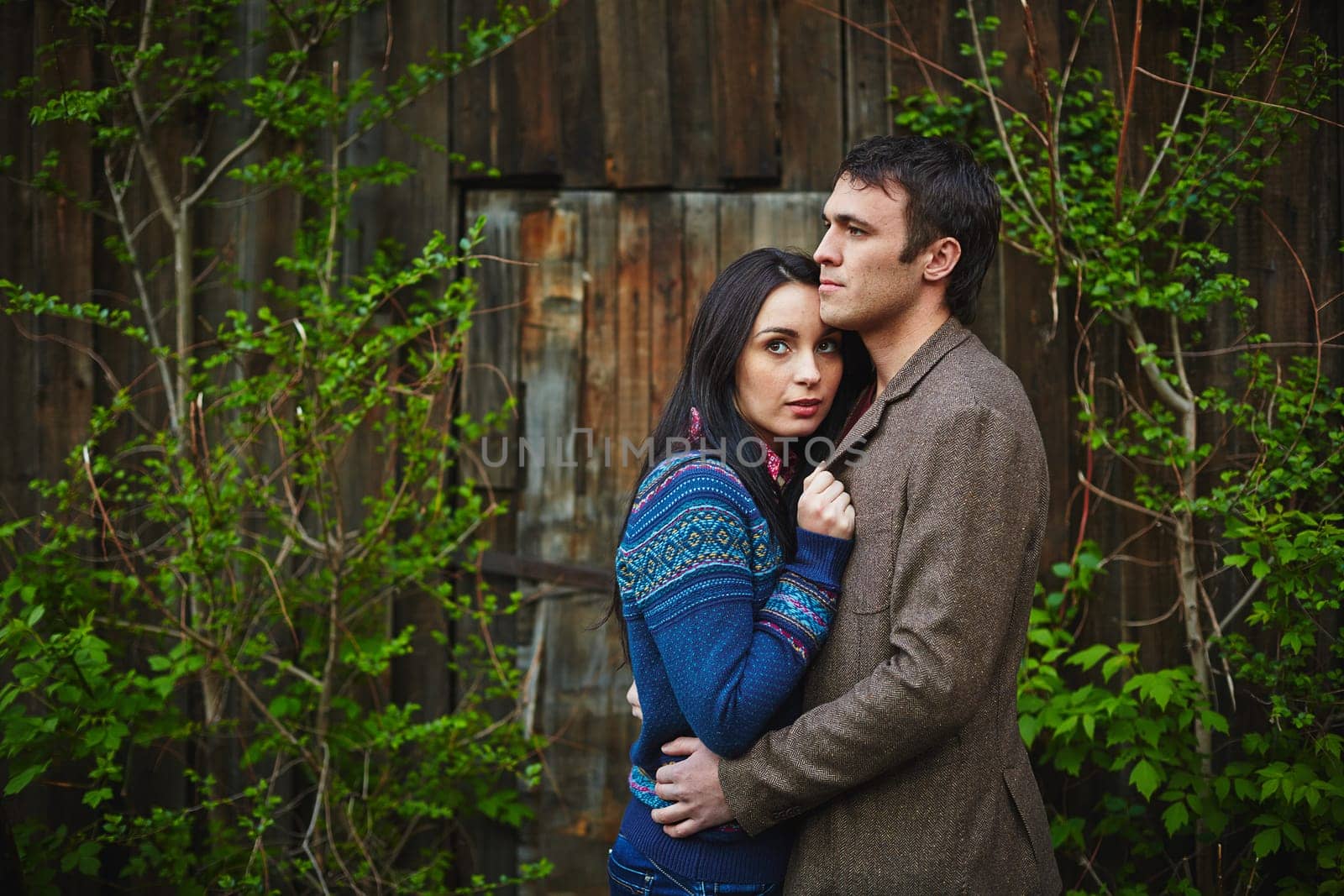 Amorous couple in casualwear having romantic date outside