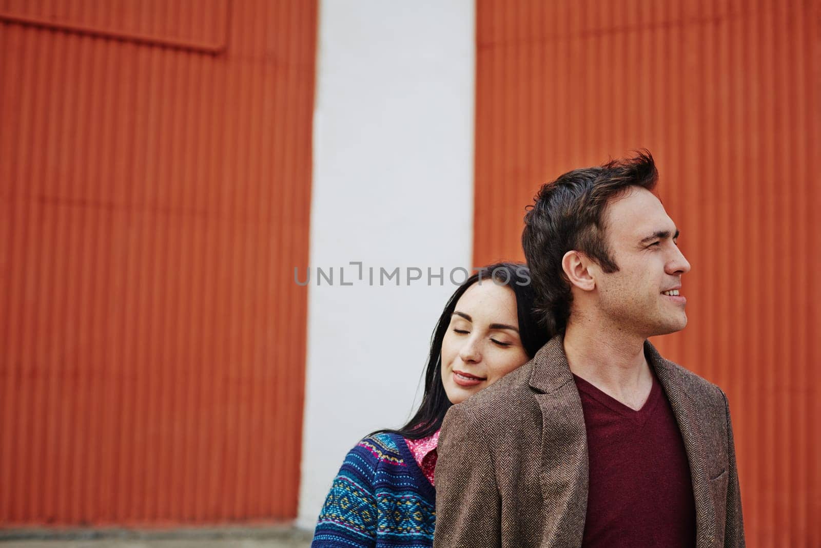 Young woman taking pleasure in being close to her sweetheart