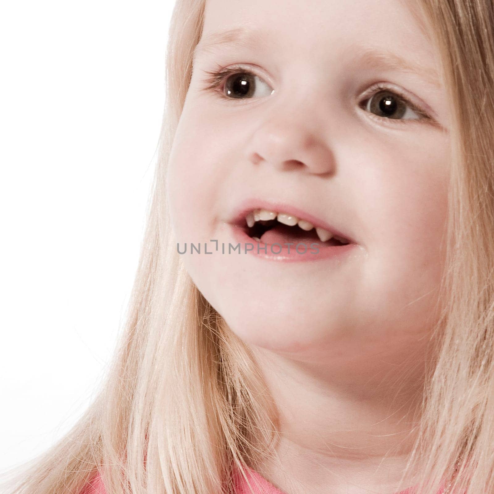 little children portraits taken in the studio on a white background