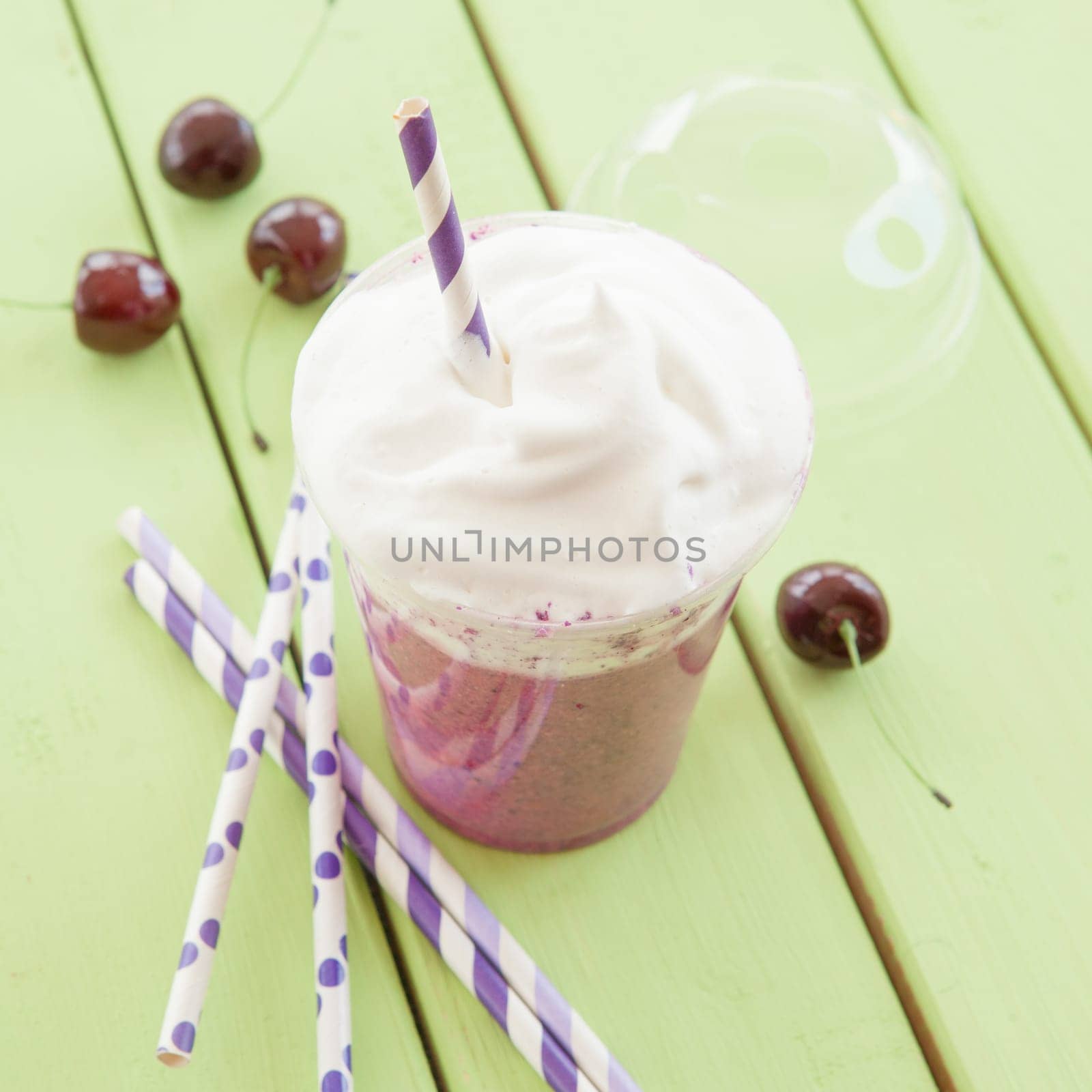 Smoothie from red fruit with whipped cream