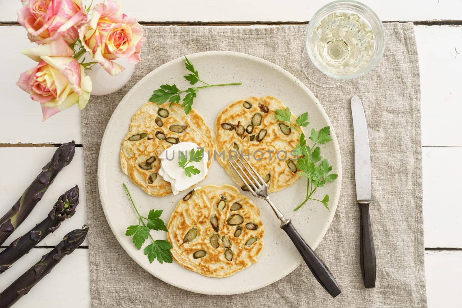 Pancakes with violet asparagus and cream cheese