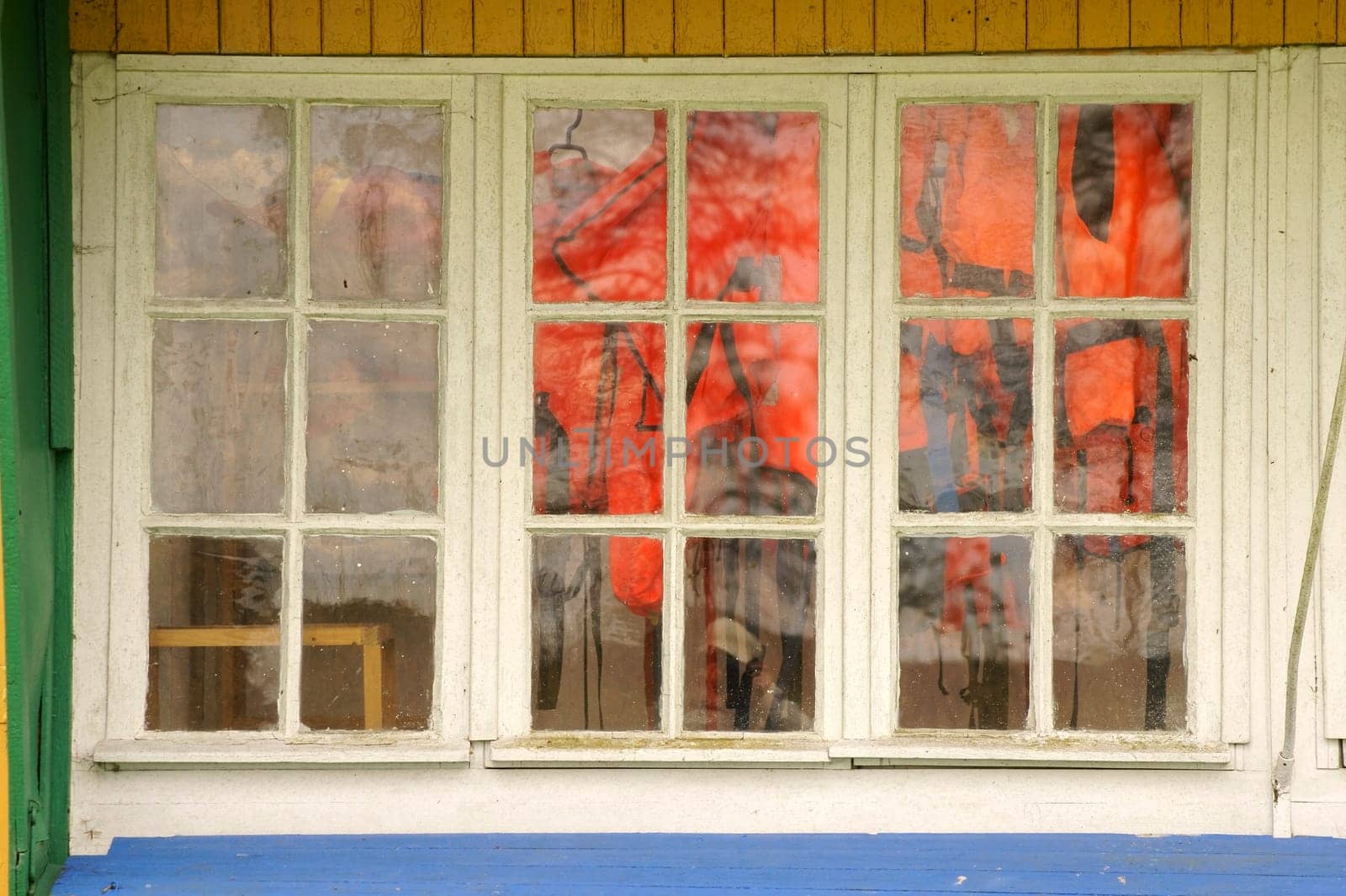 A wooden house is used as a camp for life jackets.