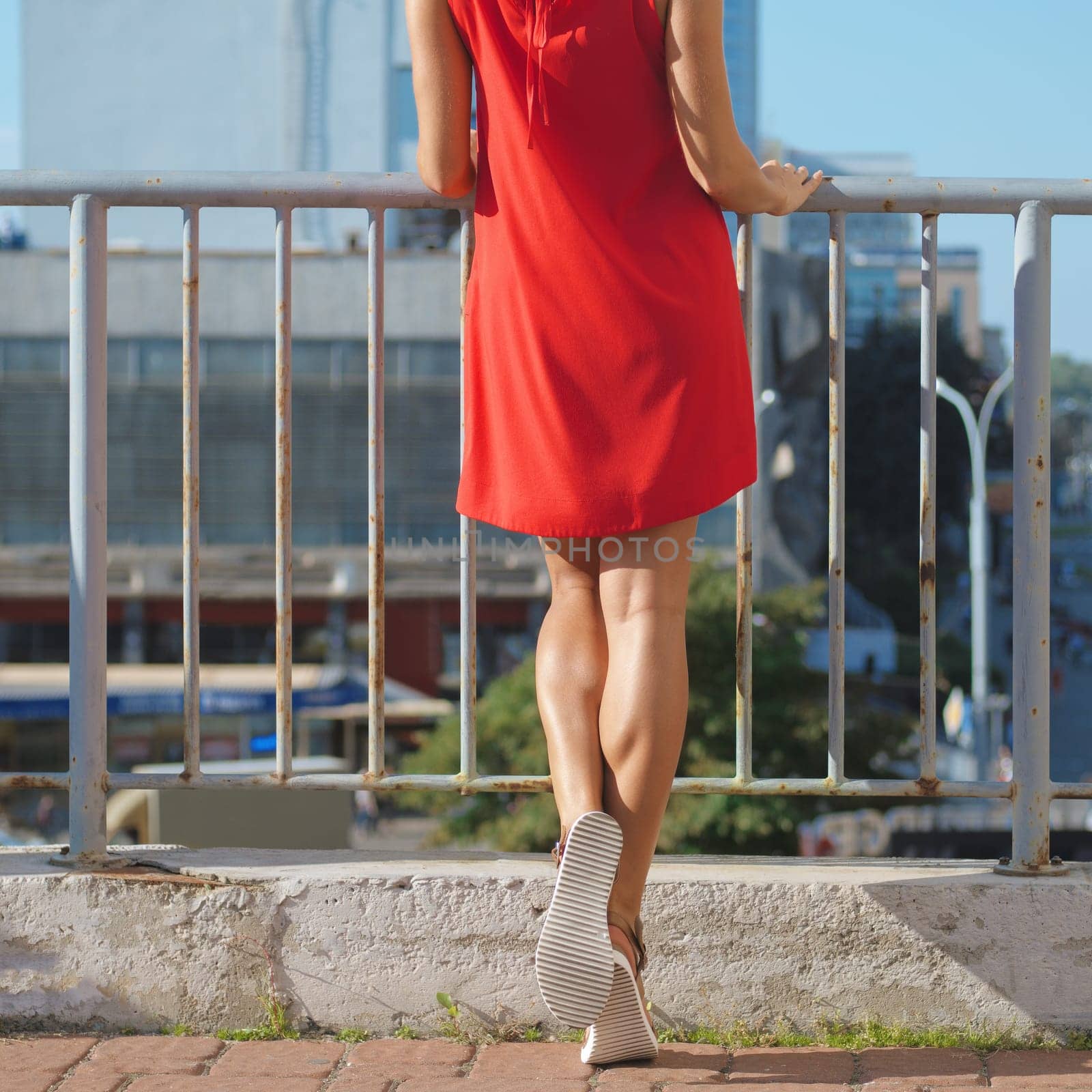 Muscular female legs posing  outdoor.