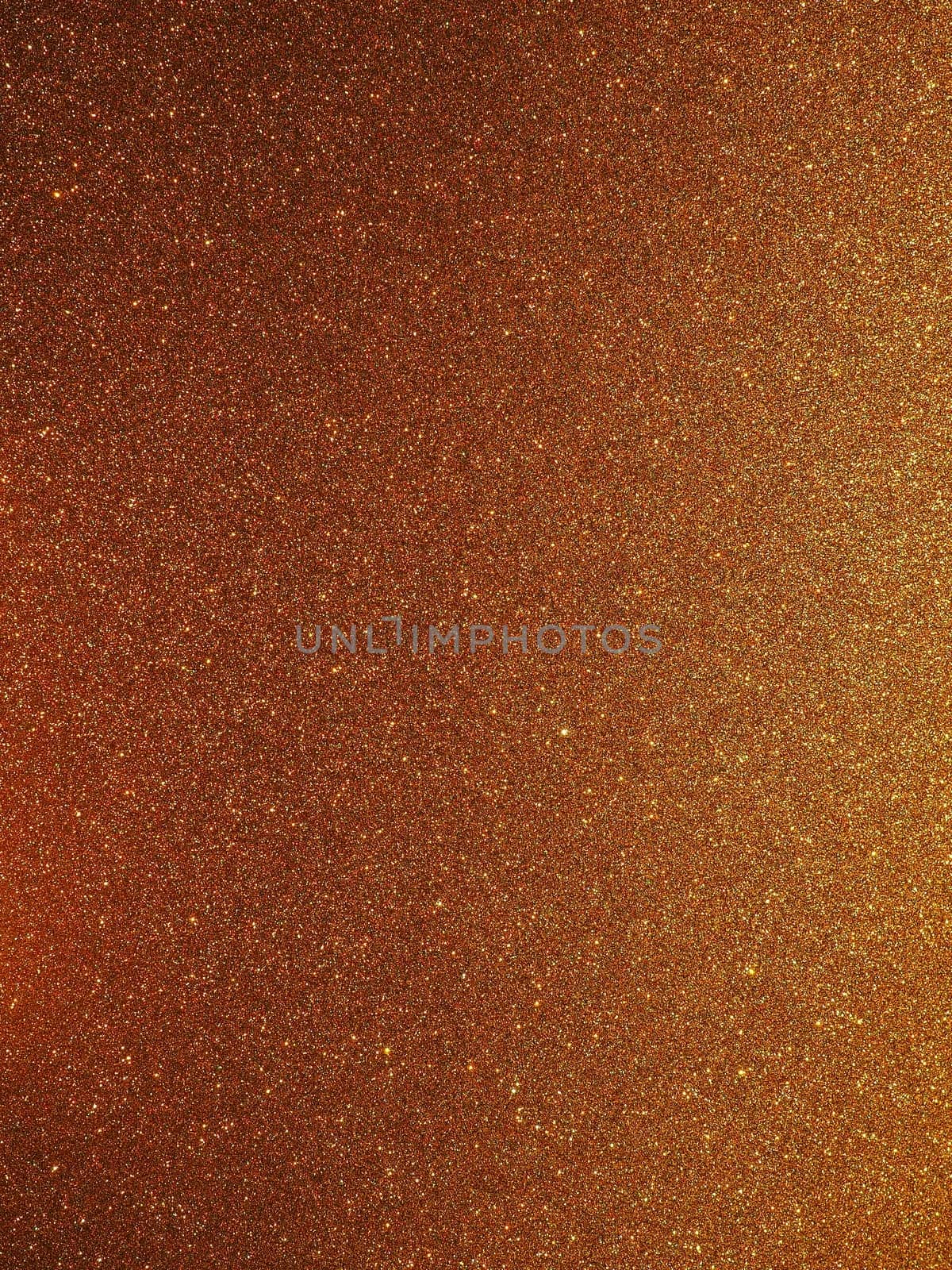 Bokeh light of gold glitters. Golden glitter texture background. Sparkling glitter wrapping paper with sequins and sparkles. Festive golden bokeh and glitter. Beautiful background