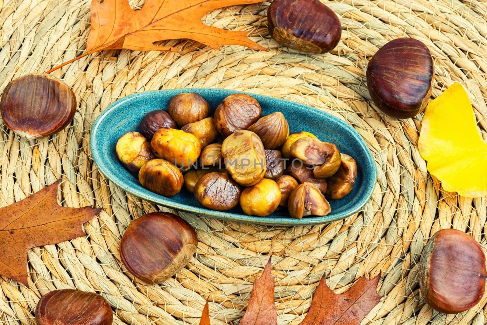 Peeled roasted chestnuts, appetizing dessert. Caramelized roasted chestnuts. Close up
